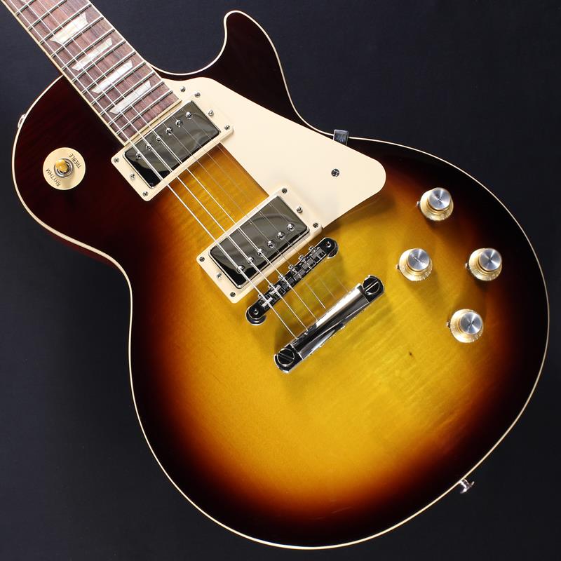 楽器種別：アウトレットGibson/Les Paul Models 商品一覧＞＞Gibson/アウトレット 商品一覧＞＞エレキギター【175，000円〜330，000円】 商品一覧＞＞レスポールタイプ/Gibson 商品一覧＞＞当店のギターは、出荷前に専門スタッフが検品・調整しているので安心です！Gibson Les Paul Standard '60s (Iced Tea) #214660095【2ND特価】商品説明※本商品は傷や一部塗装不良などがある2NDアウトレット品になります。そのため、保証内容につきましては演奏に関わる部分のみであり、外観については対象外となります。あらかじめご了承ください。Gibson Les Paul Standard '60sギブソンの定番モデル「レスポール・スタンダード」が入荷！こちらは、AAフィギュア・メイプルトップやスリムテーパーのネックシェイプを採用した60's仕様採用モデルです。ウエイトリリーフを施さないソリッドボディに、握りやすいスリムテーパーのネックをジョイント。キャビティはトラディショナルモデルと同様に、基盤を使わず配線されており、コンデンサーはオレンジドロップが使われております。サウンドの要であるピックアップには、バーストバッカー61R&バーストバッカー61Tを搭載。芯のあるクリーントーンはもちろん、歪ませても骨太でバランスの良いドライブサウンドを奏でてくれます。ギブソン王道のロックサウンドを求めるギタリストには是非ともオススメの1本です。是非この機会をお見逃しなく！商品詳細BodyMaterial:MahoganyTop:AA Figured MapleWeight Relief:NoneNeckNeck:MahoganyProfile:Slim TaperNut width:1.695 / 43.05mmFingerboard:RosewoodScale length:24.75 / 628.65mmNumber of frets:22Nut:Graph TechInlay:Acrylic TrapezoidsHardwareBridge:ABR-1 Tune-O-MaticKnobs:Gold Top Hats with Silver Reflector & PointersTuners:Grover Rotomatics w/ Kidney ButtonsPlating:NickelElectronicsNeck pickup Burstbucker:61RBridge pickup Burstbucker:61TControls:2 Volumes， 2 Tones & Toggle Switch (Hand-wired with Orange Drop Capacitors)約4.77kgハードケース付属イケベカテゴリ_エレキギター_レスポールタイプ_Gibson_Les Paul Models_アウトレット SW_Gibson_アウトレット JAN:2500010118842 登録日:2026/09/12 エレキギター ギブソン レスポール