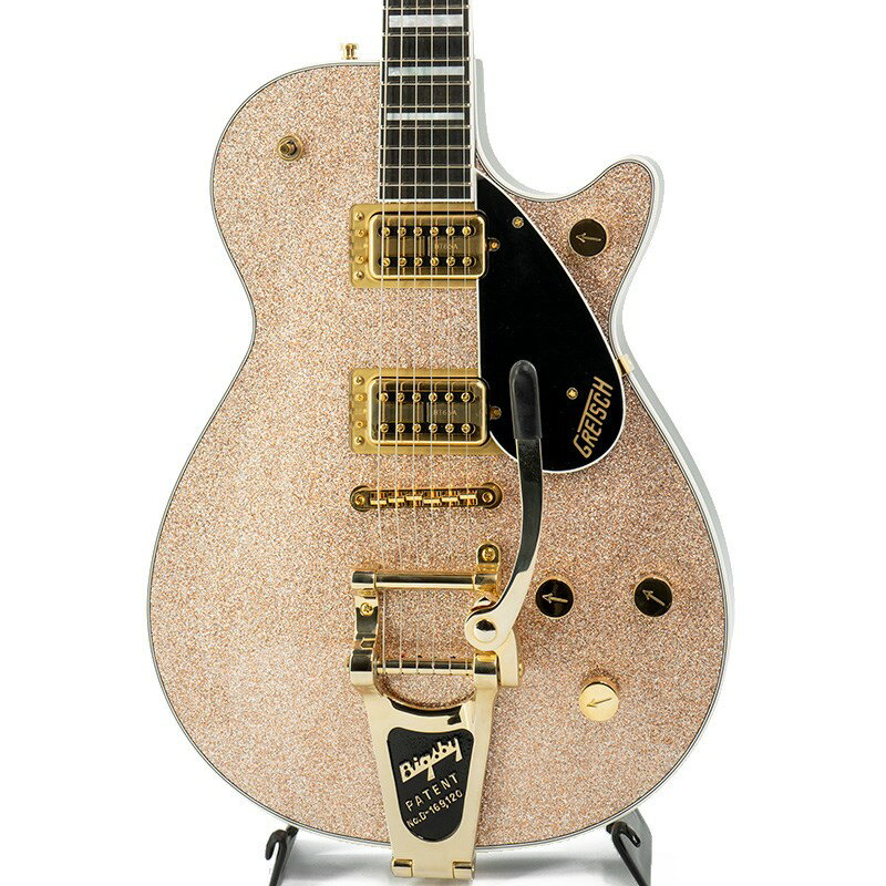 楽器種別：アウトレットGRETSCH/Jet 商品一覧＞＞GRETSCH/アウトレット 商品一覧＞＞エレキギター【205，000円〜390，000円】 商品一覧＞＞その他/GRETSCH 商品一覧＞＞当店のギターは、出荷前に専門スタッフが検品・調整しているので安心です！GRETSCH G6229TG Limited Edition Players Edition Sparkle Jet BT with Bigsby (Champagne Sparkle)【特価】【Weight≒4.02kg】商品説明新品チョイキズ特価まばゆいスパークルカラーを纏った数量限定モデルのジェットが新品チョイキズ特価で入荷です！Gretsch Professional Collection Limited EditionGretsch Jetは65年間、ロックンロールの歴史の中で最も偉大なサウンドをいくつも生み出し、ステージやスタジオで活躍するたびにそのパワーを増強させてきました。全く新しいG6229TG Limited Edition Players Edition Sparkle Jet BT with Bigsby and Gold Hardwareは、ブラックピックガードにChampagne SparkleとOcean Turquoise Sparkleという思わず振り向かせるような二色展開からなる音とパフォーマンスの両方において半世紀にわたる集大成とも言えるモデルです。・太く、音響的に豊かなチャンバード マホガニーどのJet BTモデルも、強く、バランスのとれたミッドレンジを生み出すメイプルトップを備えた厳選されたマホガニーボディから生成され、チャンバードボディは、幅広く調和のとれた豊富でスムーズなアタックと押し広げられた帯域の多様なトーンをもたらします。・Broad Tron BT65ピックアップがもたらすパワーとトーンこの強力なプラットフォームは、Gretsch Broad Tron BT65によってサウンドが更にパワーアップします。有名なピックアップ製作の匠であるティム・ショーによって設計されたBT65は、緻密にギターのサウンドパレットをキャプチャし、強力な中域音、増強された低音と非常に明確で滑らかな高音を響かせます。空気を揺るがすパワーとフルスペクトルのトーンの完璧な組み合わせにより、比類のないオーバードライブときらめくクリーンをもたらします。・Players Editionの快適性、操作性、パフォーマンスプレイヤーの快適さを優先して開発されたJet BTは、フレット間のポジション移動を大幅に向上させる低く設定されたセットネックにより、ピッキング時に高い快適さと精度を提供します。新しいフルアクセス仕様のエッジロール加工されたカッタウェイとテーパードヒールにより、ポジション移動の際に何にも妨げられることなく、スムーズなフィンガリングをサポートします。この洗練されたデザインは、ヴィンテージの隠された美学を保ちながら、見た目だけでは分からない感覚的に捉えることのできる重要な仕様を備えています。Jet BTには、Squeezeboxペーパーインオイルコンデンサ付ののノーロードマスタートーンポット、トレブルブリードサーキット付きマスターボリューム、個々のピックアップボリュームコントロールなど、トーンとパフォーマンスを自在に操ることができるPlayers Edition機能が追加されています。※本商品はプレイアビリティに影響を及ぼさない程度のボディ全体の細かな傷、金属パーツのくすみが散見される特価品となります。外観は保証対象外となります事、予めご了承ください。S/N JT22094014Weight≒4.02kg商品詳細Series: Professional CollectionBody Material: MahoganyBody Finish: GlossNeck: Mahogany， Standard UNeck Finish: GlossFingerboard: Ebony， 12 (305 mm)Frets: 22， Medium JumboPosition Inlays: Mother of Pearl Big Block (Ebony)Nut (Material/Width): Graph Tech TUSQ XL， 1.6875 (42.86 mm)Tuning Machines: Gotoh LockingScale Length: 24.6 (625 mm)Bridge: Anchored Adjusto-MaticPickguard: Bound Black Plexi with Gold Gretsch LogoPickups: Broad’Tron BT-65 (Bridge)， (Middle)， Broad’Tron BT-65 (Neck)Pickup Switching: 3-Position TogglePosition 1. Bridge PickupPosition 2. Bridge And Neck PickupsPosition 3. Neck PickupControls: Volume 1. (Neck Pickup)， Volume 2. (Bridge Pickup)， Master Volume w/ Treble Bleed， Master Tone w/ No-Load PotControl Knobs: ArrowHardware Finish: GoldStrings: Nickel Plated Steel (.010-.046 Gauges)ハードケース付属中古＆アウトレット販売・高額買取専門店★★★★★★★★★★★★★★★★　イケベUSEDギターズ ゲット★★★★★★★★★★★★★★★★楽器を安く買うなら「ゲット」楽器を高く売るなら「ゲット」！！中古楽器を渇望しています！！楽器が常時足りません！ご不要なギターの売却をお考えの方、常に高額査定にて買取強化中です！お気軽にお問い合わせください！もちろん、随時お買い得品も入荷中！お得なギターをお探しの方も必見です！★★★★★★★★★★★★★★★★イケベカテゴリ_エレキギター_その他_GRETSCH_Jet_アウトレット SW_GRETSCH_アウトレット JAN:0885978957682 登録日:2023/09/26 エレキギター グレッチ ジェット