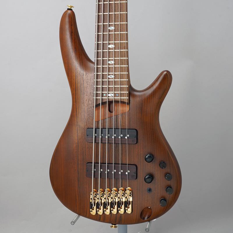 楽器種別：アウトレットIbanez/SR Prestige 商品一覧＞＞Ibanez/アウトレット 商品一覧＞＞ベース【220，000円〜415，000円】 商品一覧＞＞エレキベース/小型ボディ・多フレット/Ibanez 商品一覧＞＞当店のベースは、出荷前に専門スタッフが検品・調整しているので安心です！Ibanez SR5506-MHF 【特価】商品説明【数量限定アウトレット特価】SR Prestigeウッディな質感とアピアランス、豊かなローエンドとウォーム・トーンが持ち味の#5500モデル私たちIbanezは、数多くのベーシストの声、音楽やファッションのトレンドを取り入れることで常に時代にマッチするSR ?Soundgear- ベースを1987年の誕生以来、生み出し続けてきました。当初から変わらず在り続けるSRのアイデンティティは、『体にフィットするコンパクト・ボディ、スリムネック、多彩なサウンド』を備えたエレクトリック・ベースである、ということです。これまで追求し続けてきた緻密さ、高性能、優れたプレイアビリティはそのままに、サウンドとトーン、更にそれらの応用性の高さを根幹から見詰め直したプロフェッショナルのためのベースとしてMade in Japanのハイエンド、PrestigeシリーズのSRモデルをリニューアルします。■アフリカン・マホガニー材ボディ・バックに、オヴァンコール材トップを組み合わせた3次元アーチドSRボディベース・サウンドに欠かせない豊かな中低音域特性とウォームなトーンに加え、アタック感と歯切れの良い高音域特性を求めたボディのマテリアル・チョイスです。木材本来の質感を色濃く感じられる艶消し仕上げを採用しました。■全ての奏者にとって握り易いを追求し究極までシェイピングしたAtlas HPスリム・ネック■ウッド・カバーをまとったNordstrand製Big Singleピックアップシングルコイル・ピックアップさながらの明瞭さと、パワフルでアグレッシブなサウンドを特徴とするNordstrand Big Singleピックアップを搭載しています。ピックアップ・カバー：ローズウッド■EQ ON時＆バイパス時どちらの環境でも機能するトーン・コントロール■3パターンのミッド帯周波数切り替えスイッチ装備、Sonitechアクティブ3-band EQワイド・レンジ＆低ノイズのアクティブ・サウンドを生み出す3バンドのイコライザーに加え、トーン・コントロールを装備しました。（トーン・ノブ引上：EQバイパス）EQのON時にはもちろんのこと、EQバイパス時にもトーン・コントロールが可能です。またミニ・スイッチの切り替えにより、ベース・サウンドの要である中音域の調整周波数帯を3パターンで選択可能です。バックパネルに装備したディップ・スイッチを切り替えることで、そのパターンをハイ・ミッド もしくは ロー・ミッド指向に変更可能です。■Prestige フレット・エッジ・トリートメント従来モデルのSR Prestigeよりも硬度の高いニッケル・シルバー・フレットを装備しています。フレット・エッジは滑らかに加工しており、一段上の弾き心地を実現しています。■高精度でスムース、チューニング・スタビリティに定評のあるGotoh製マシンヘッド■Graph Tech製 BLACK TUSQ XLナット■D'Addario EXL Nickel Wound弦■専用ハードシェル・ケース付属※掲載画像はサンプルです。製品の特性上、杢目や色合いは1本ごとで異なります。詳細ご希望の際には、お手数ですがお問い合わせ下さいませ。宜しくお願いします。商品詳細【Specifications】■Neck type: Atlas-6 HP 5pc S-TECH WOOD Maple /Walnut neck■Body: Ovangkol top / African Mahogany body■Fretboard: Rosewood fretboard w/Mother of Pearl & Abalone oval inlay■Fret: Medium frets w/Prestige fret edge treatment■Bridge: MR5S bridge■String space: 16.5mm■Neck pickup: Nordstrand Big Single wood covered neck pickup■Bridge pickup: Nordstrand Big Single wood covered bridge pickup■Equalizer: Ibanez Sonitech Preamp 3-band EQ w/EQ bypass switch (push/pull)， 3-way Mid frequency switch w/Hexa Mid system■Hardware color: Gold■String gauge: .032/.045/.065/.085/.105/.130 (.032 + EXL165 + .130)【Neck Dimensions】■Scale: 864mm/34inch■Width at Nut: 54mm■Width at Last Fret: 83mm■Thickness at 1st: 19.5mm■Thickness at 12th: 23mm■Radius: 500mmRイケベカテゴリ_ベース_エレキベース_小型ボディ・多フレット_Ibanez_SR Prestige_アウトレット SW_Ibanez_アウトレット JAN:4549763360113 登録日:2026/09/30 エレキベース アイバニーズ イバニーズ