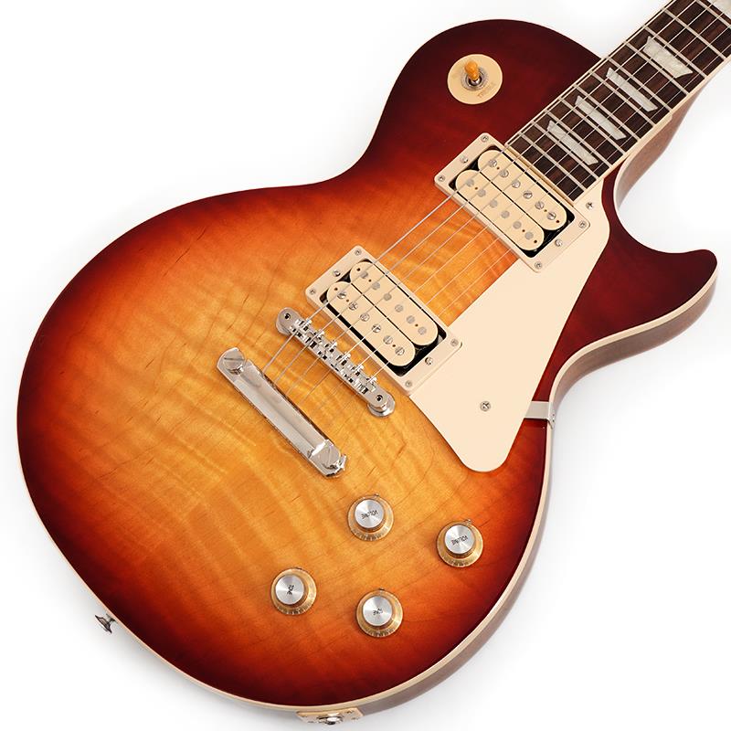 楽器種別：新品Gibson/Les Paul Models 商品一覧＞＞Gibson/新品 商品一覧＞＞エレキギター【210，000円〜400，000円】 商品一覧＞＞レスポールタイプ/Gibson 商品一覧＞＞当店のギターは、出荷前に専門スタッフが検品・調整しているので安心です！Gibson Les Paul Standard 60s Double Trouble (Vintage Bourbon Burst) 【S/N 215450179】商品説明Les Paul Standard '60s Double TroubleLes Paul Standard 60s Double Troubleは、通常のLes Paul Standard 60sモデルと同様の機能と特徴をすべて備えながらも、さらなるヴィンテージの風格が吹き込まれた特別仕様モデルです。この限定生産となるレスポールは、通常のLes Paul Standard 60sモデルとは2つの点で異なります。本モデルにはピックアップ・カバー非装着（オープン・タイプ）のBurstbucker 61RとBurstbucker 61Tピックアップが2基搭載されており、それぞれにダブル・クラシック・ホワイトのボビンとBurstbucker 61標準のアルニコ5マグネットを採用しています。また、フィニッシュにも変更が加えられています。本モデルでは、標準のグロス・ニトロセルロース・ラッカー・フィニッシュのヴィンテージ・カラー・バリエーションを採用。グロス・ニトロセルロース・ラッカー・フィニッシュは1950年代の新品同様の仕上がりを再現していますが、Les Paul Standard 60s Double Troubleでは、わずかに色褪せたフルグロス・ニトロセルロース・ラッカーのヴィンテージ・カラー・フィニッシュを使用しており、年月を経て自然に生じる経年変化の風合いを再現しています。また、カラーはすべて手作業でスプレーされるため、バースト・パターンは個体ごとにわずかに異なります。このような特色が加えられながらも、Les Paul Standard 60sの広く愛される基本仕様に変更はなく、ウェイト・リリーフ無しのソリッド・マホガニー・ボディ、AAグレードのフィギュアド・メイプル・トップ、Slim Taperプロファイルのマホガニー・ネック、ローズウッド指板、22フレット仕様のミディアムジャンボフレット、トラペゾイド・インレイを擁しています。また、ABR-1 Tune-O-Maticブリッジ、アルミ製ストップバー・テイルピース、キドニーボタンのGrover Rotomaticチューナー、シルバーリフレクターとダイヤルポインター付きのゴールド・トップハット・ノブを搭載。オープン・タイプのBurstbucker 61R (ネック) とBurstbucker 61T (ブリッジ)は、ダブル・クラシック・ホワイト・ボビンであること以外は標準のBurstbucker 61と同様の仕様となっています。手作業で製作され、アルニコ5マグネットを使用し、オーディオテーパー・ポットとOrange Dropキャパシターが手配線されています。ダブル・クラシック・ホワイトのボビンとヴィンテージ・フィニッシュの組み合わせにより、Les Paul Standard 60s Double Troubleは気品あるヴィンテージの風格を醸し出しながらも、手の届きやすい価格を実現しています。各カラー500本のみの限定生産となります。S/N 215450179Weight=4.22kg商品詳細BodyMaterial: MahoganyTop: AA Figured MapleBinding: Cream; Top and FretboardNeckNeck: MahoganyProfile: SlimTaperNut width: 1.69/43.053mmFingerboard: RosewoodScale length: 24.75/628.65mmNumber of frets: 22Nut: Graph TechInlay: Acylic TrapezoidHardwareBridge: ABR-1 Tune-O-MaticTailpiece: Aluminum Stop BarTuners:Grover Rotomatic with Kidney ButtonElectronicsNeck pickup: Burstbucker 61R， Double Classic White BobbinsBridge pickup: Burstbucker 61T， Double Classic White BobbinsControls:2 Volume， 2 Tone; Hand-wired with Orange Drop Capacitorsハードケース付属イケベカテゴリ_エレキギター_レスポールタイプ_Gibson_Les Paul Models_新品 SW_Gibson_新品 JAN:4570156012999 登録日:2026/06/04 エレキギター ギブソン レスポール