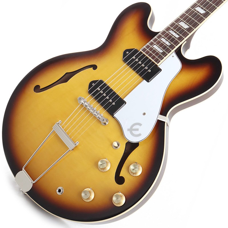 楽器種別：新品エレキギター/Epiphone 商品一覧＞＞エレキギター/Epiphone/アーチトップ 商品一覧＞＞エレキギター【305，000円〜570，000円】 商品一覧＞＞当店のギターは、出荷前に専門スタッフが検品・調整しているので安心です！Epiphone Casino USA Collection (Vintage Sunburst) [SN.219430119]商品説明USA製のEpiphone Casinoが待望の復活です!!!60年代ブリティッシュ・インヴェイジョン期を象徴するアーチトップ！メイド インUSA！1961年の発売開始以来、ポール・マッカートニー、ジョン・レノン、ジョージ・ハリスン、キース・リチャーズ、レイ・デイヴィス、デイヴ・デイヴィス、ポール・ウェラーなど、数多くのミュージシャンに愛用されてきたEpiphone Casinoが米国製で50年以上の時を経てついに復活。USAエピフォン・コレクションの新しいカジノは二種類のフィニッシュを用意。クラシックなメイプル材とポプラ材によるボディをベースに、ロイヤルタン・ニトロセルロースラッカー仕上げ（ニッケル・ドッグイヤーGibson USA P-90搭載）とヴィンテージ・サンバースト・ニトロセルロースラッカー仕上げ（ブラック・ドッグイヤーGibson USA P-90搭載）をラインアップ。USA コレクション・Epiphone Casinoには、Orange DropコンデンサとGibson USA P-90 Dogearシングルコイルピックアップが搭載され、エレクトロニクス部はハンドワイヤリングにより結線されています。工場出荷時の弦はギブソン・ストリングズが採用されています。商品詳細Weight≒2.94kgBodyShape : CasinoMaterial : 3-ply Maple/Poplar/MapleTop : 3-ply Maple/Poplar/MapleBack : 3-ply Maple/Poplar/MapleBracing : Quarter Sawn SpruceBinding : Single-ply CreamNeckNeck Material : Solid MahoganyProfile : Rounded CScale Length : 24.75 / 628.65mmFingerboard Material : Indian RosewoodFingerboard Radius : 12Number Of Frets : 22Frets : Medium JumboNut Material : Graph TechNut Width : 1.69 / 42.85mmInlays : Acrylic ParallelogramHardwareFinish : NickelTuner Plating : NickelBridge : ABR-1Tailpiece : Thinline TrapezeTuning Machines : Vintage DeluxePickguard : White (Casino) Three-ply White/Black/White/Black pickguard with Epiphone logoTrussRod : AdjustableTruss Rod Cover : Bullet shaped; 2-layer (B/W); Vintage E in WhitePickup Covers : Black (Royal Tan) Nickel (Vintage Sunburst)ElectronicsNeck Pickup : Gibson USA P-90 DogearBridge Pickup : Gibson USA P-90 DogearControls : 2 volume， 2 tone， hand-wired with Orange Drop(R) capacitorsPickup Selector : 3-way toggleOutput Jack : 1/4Strings Gauge .010， .013， .017， .026， .036， .046ハードケース付属イケベカテゴリ_ギター_エレキギター_Epiphone_アーチトップ_新品 JAN:4580568413727 登録日:2023/08/28 エレキギター エピフォン セミアコ フルアコ