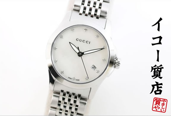 製品仕様 商品名 　グッチ　★希少　美品　Gタイムレス　YA126504　レディース　12Pダイヤ/ホワイトシェルダイヤル　クオーツ　【中古】 型番 　YA126504 サイズ／寸法 　ケース径：約縦27mm×横27mm　ケース厚さ：約7mm　重さ：約56g　腕周りサイズ（内寸）：約12cm-14cm 素材／材質 　SS×サファイアガラス 仕様 　クオーツ　カレンダー　12Pダイヤ/ホワイトシェルダイヤル 程度 　ランクA+ 付属品 　無し ご注意事項 オーバーホール実施の場合は、正規部品を扱う信頼できる業者に依頼しております。 モニターの発色の具合によって実際のものと色が異なる場合がございます。代引きの上限金額（30万円）を超える場合は、ヤマトコレクト（代引き)でのお取引はできません。お支払いは、クレジットカード又は銀行振込にてお願い致します。店舗での販売も同時におこなっている為、ご注文のタイミングによっては、商品が在庫切れになっている場合がございます。在庫管理には十分配慮しておりますが、何卒ご了承下さいますようお願い申し上げます。 その他商品説明 イタリアのファッションブランドとして世界的な人気を誇るグッチから、シルバーボディにホワイトシェルダイヤルが大変美しい「Gタイムレス」をご紹介します。当商品はグッチを代表する人気モデル「Gタイムコレクション」のレディースモデルであり、角度によって色合いが美しく変化するホワイトシェルに12Pダイヤがより一層の高級感を演出しています。また、ブレスレットにはつや消し×鏡面加工がバランス良く施されており、ドレッシーな仕上がりとなっています。どんなファッションとも相性が良く、フォーマルからカジュアルまで幅広くマッチします。この機会に是非ご検討下さい。状態：本体・ブレスレットに若干の微細な小傷はありますが、いずれも気になるものではありません。ガラスのカケ・傷等はありません。ランクA+につき自信を持ってお勧めします。　