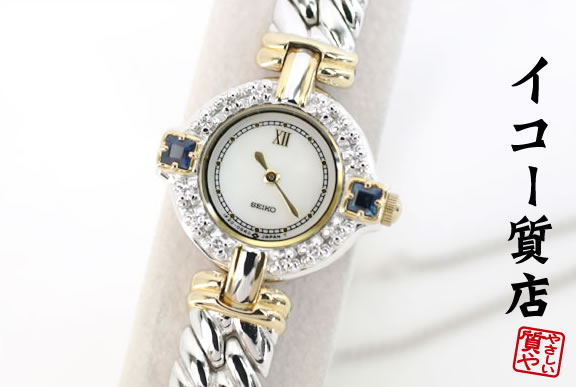 乐天商城 - セイコー　★希少　美品　エクセリーヌ　1F20-0B60　ダイヤ×サファイアベゼル　シェルダイヤル　レディース　【中古】7631