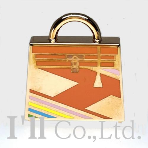 【中古】HERMES　エルメス　キュリオジテ　ケリー　ラキュ　メタル　ラッカー　ピンクゴールド　オレンジ　ブランドジュエリー　アクセサリー　チャーム　ペンダントトップ　ネックレストップ　バッグチャーム　ケリーバッグモチーフ【中古】【60618】