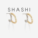 【ブランド】 SHASHI(シャシ) 【商品名】 Gemini Hoop 【カラー】 GOLD 【詳細】 18Kゴールドメッキ SHASHI(シャシ) とは... Shashiはアメリカ発のアクセサリーブランドです。 オシャレでデイリー使いしやすいデザインが人気で、テイラー・スウィフトやリアーナなどセレブにも愛用されています。 雑誌VOGUEやヴィクトリアズシークレットの撮影にも使われる人気ブランドです。 ロンハーマンでも取り扱いがあります。 値段も1万円以下のものが多く、手頃な価格なのも嬉しいポイント。　