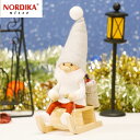 商品概要ノルディカニッセ そりに乗るサンタ サイレントナイト NRD120646 木製 人形 デンマーク クリスマス プレゼント ギフト 飾り 窓 子供 大人 おもちゃ 北欧 インテリア 「商品説明」 そりに乗って子供たちへプレゼントを届けるサンタクロース。 木製のそりや、麻袋に入れられたプレゼントなど、細かなディティールからこだわりが感じられるアイテムです。 静かな冬の夜をモチーフにしたニッセは、北欧風のインテリアとの相性がよく、クリスマスを終えてからも長く飾ることができるのも人気の理由です。 サイレントナイトシリーズ 『サイレントナイトシリーズ』は、ライトグレーと白を基調としたこれまでにない淡い雰囲気が特徴です。静かな冬の夜をモチーフにしたデザインは、北欧風のインテリアとの相性がよく、クリスマスを終えてからも長く飾ることができます。 Nordika Nisse(ノルディカニッセ)は、ノルディカデザイン社が手掛けるハンドメイドの木製人形ブランドです。 デンマークの妖精 “ニッセ""をモチーフにした人形をつくり、世界に幸福を届けています。 ニッセは古来より、子どもたちや家を守り、クリスマス時期にはサンタクロースのお手伝いをすると言われている北欧の妖精です。 いたずら好きで働き者のニッセが住む家には幸福が訪れると考えられ、デンマークで長く愛されています。 人形は、工房の職人がひとつひとつ手作業で仕上げているため、それぞれが異なった表情を持ち、同じ物は世界にふたつとありません。 手作りのため個体差があります。 ひとつひとつ職人さんによる手作りのため下記のように商品画像と異なる場合があります。 ・本体の大きさ、形状、カラー ・ペイントのずれ ・装飾品の形状の違い ・接着剤のはみ出し ・シール添付の場所や向き ・全体的な表情や印象など また、木の表情により、黒点やラインがある場合があります。 できる限り均一のお顔になるように現地の職人も努力しておりますが、 描き手が一人ではないため眼の角度や位置のズレといった個体差はどうしても発生してしまいます。 恐れ入りますが、この場合は不良として商品の交換、返品はお受けいたしかねますので予めご了承くださいませ。 「特徴・品質」 ・細部にまでこだわった手作りの品質 ・北欧の伝統と温かみのあるデザイン 「仕様」 ・素材: 天然木(バーチ材)、フェルト他 ・サイズ: 約150mm ・生産国: エストニア 「使用・手入れについて」 ・直射日光や高湿度を避けて保管してください ・乾いた布で優しく拭き取ってください 注意事項 ・実物の色は画像と多少異なる場合があります ・手作り品のため、個体差があります ・実物に近い色を画像で表現していますが、撮影環境、お使いのディスプレイなどの条件によって多少の誤差が生じる場合がございます。 ・ご注文タイミングやご注文内容によっては、購入履歴からのキャンセル、修正を受け付けることができない場合がございます。 ・複数の同時注文がおきた場合、システムのタイムラグの理由から、在庫切れの状態でも購入が可能となる場合がございます。その場合、こちらからメールでご連絡させて頂きます。 おすすめ特集