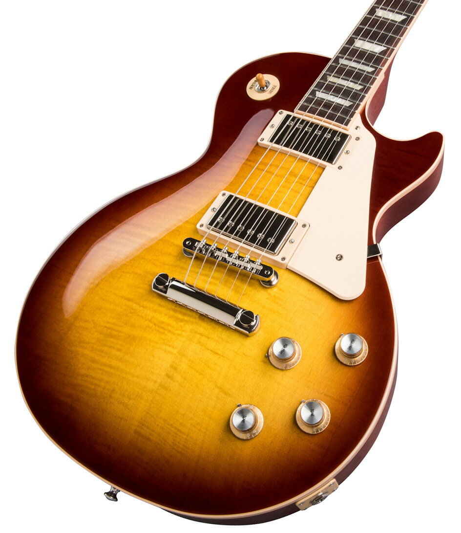 60s Les Paul Standardがパワーアップして登場！ 全世界待望の60s Les Paul Standardがパワーアップして登場！ Gibson 60s Les Paul Standard 、メイプルトップにウエイトリリーフを廃したマホガニーボディ、60年代の薄めのネックを採用した往年のレスポールスタンダードを求めるプレイヤーに最適な一本です。 ピックアップにはアルニコVマグネットを使用したBurstbucker 61R(Neck)/Burstbucker 61T(Bridge)を搭載し、左手の細かなニュアンスやピッキングの強弱、繊細なボリュームコントロールといった演奏表現を余さず出力します。 近年のギブソンに見られる基盤でなく、ハンドワイヤードの電装にはオレンジドロップキャパシターを搭載！ グローバーペグ、ワイヤーなしのABRブリッジにアルミニウム製ブリッジ・テイルピースなど、ヴィンテージを意識した拘りが満載でございます。 使い込むほどに手に馴染み、より一層オールド感が引き立つ至極の一本となるでしょう！ 付属品：ハードケース、Gibsonユーザー登録カード ※お届けにお時間を要する場合には別途お知らせいたします。 ご購入後、同梱されるユーザー登録カードに必要事項をご記入の上、ギブソン・ジャパンへご郵送ください。 ユーザー登録したご本人様に限り、メーカー規定の故障に対して無期限での保証が提供されます。 主な仕様(ネック/ボディ) Neck MaterialMahoganyNeck ProfileSlim TaperScale Length24.75"Fingerboard MaterialRosewoodFingerboard Radius12"Number Of Frets22FretsMedium JumboNut MaterialGraph TechNut Width1.695"End of Board Width2.26"InlaysAcrylic TrapezoidsBody MaterialMahoganyBody TopAA Figured MapleWeightReliefNoneFinishGloss Nitrocellulose Lacquer 主な仕様(パーツ/電装系など) Hardware FinishNickelBridgeABRTuning MachinesGrover Rotomatics w/ Kidney ButtonsPickguardCreamControl KnobsGold Top Hats with Silver Reflector & PointersSwitch TipAmberSwitchwasherCreamJack Plate CoverCreamNeck PickupBurstbucker 61RBridge PickupBurstbucker 61TControls2 Volumes, 2 Tones & Toggle Switch (Hand-wired with Orange Drop Capacitors)Strings.010, .013, .017, .026, .036, .046CaseHard Shell Case ■保証:1年 ※こちらの商品画像はサンプルです。 複数のモールに掲載されているため、売却に伴う商品情報の削除は迅速を心掛けておりますが必ずしもリアルタイムではございませんので、ご注文後に万一売り切れとなっておりました際は誠に申し訳ございませんがご容赦くださいませ。 ブリッジに使用されているABRは現在アジャスタブルスタイルの仕様に変更される過渡期となっており、使用されているパーツは混在しております。予めご了承くださいませ。