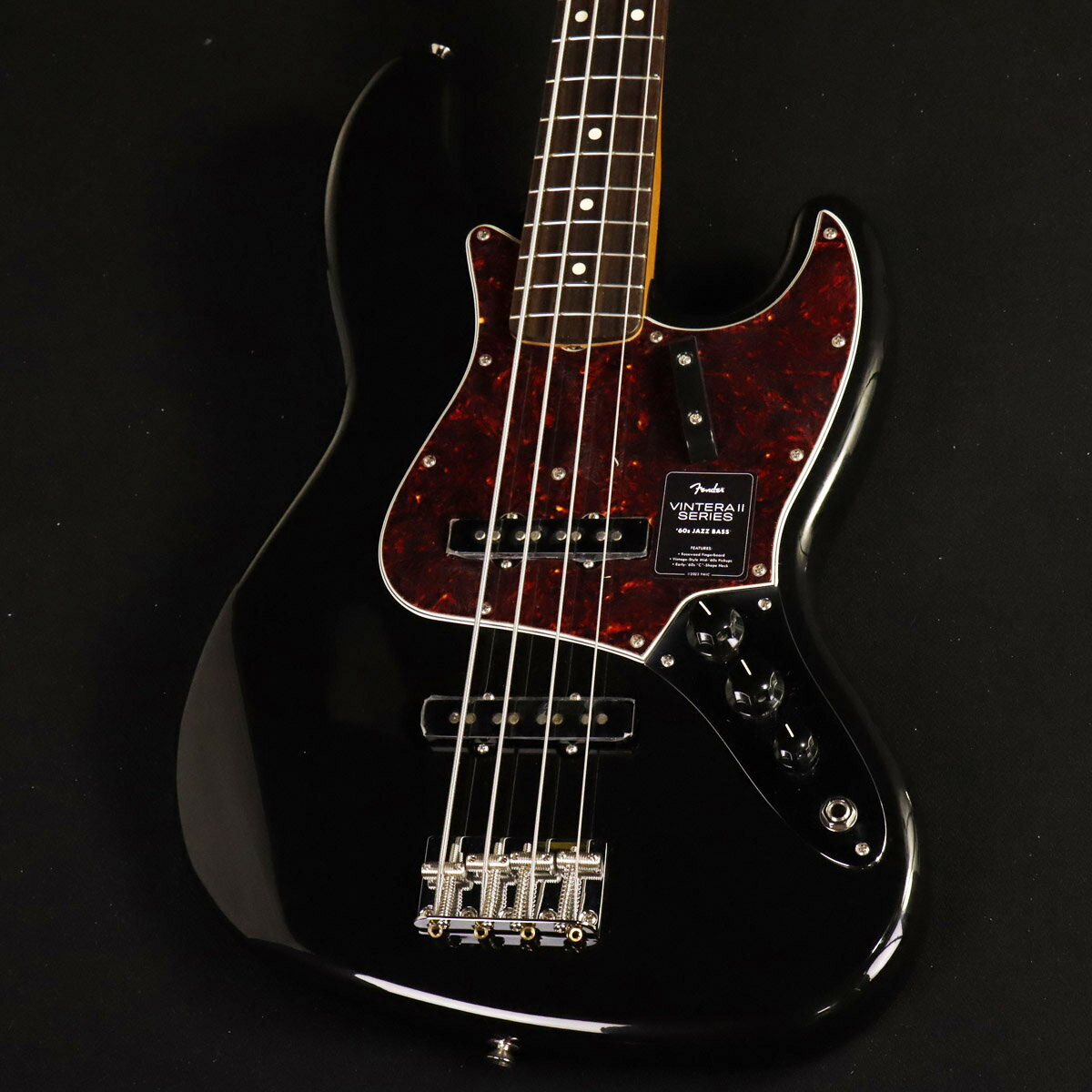 フェンダー黄金時のスタイルとサウンドをお手頃な価格で実現！"Vintera II"シリーズ登場！ Vintera II 60s Jazz Bassは、60年代のタイムレスなサウンドを現代に蘇らせ、フェンダーならではのアイコニックなルックス、インスピレーション、比類ないトーンを提供します。 Vintera II 60s Jazz Bassは、アルダーボディにローズウッド指板のメイプルネックを採用し、パンチと透明感に溢れたクラシックなフェンダートーンを実現します。 60年代初期の”C”シェイプネックは、直感的で魅力的なプレイアビリティを提供する60年代モデルのネックプロファイルをベースに設計されており、7.25インチラジアス指板とヴィンテージトールフレットにより、大胆なベンディングや繊細なビブ ラートが可能で、ヴィンテージの快適さが得られます。 ヴィンテージスタイルの60年代初期のシングルコイルピックアップは、温かでダイナミック、パワフルなフェンダーサウンドを提供します。 ヴィンテージスタイルの4サドル式ブリッジとチューニングマシンは、クラシックなルックスに加え、イントネーションとチューニングの安定性を向上させます。 Vintera II 60s Jazz Bassのクラシックなヴィンテージフィールと比類なきフェンダーサウンドで、あなたにしかできない、新たな音楽の歴史を刻み始めましょう。 主な仕様 Body Material : Alder Body Finish : Gloss Polyester Neck : Maple, Early ‘60s “C” Neck Finish : Gloss Urethane Fingerboard : Slab Rosewood, 7.25” (184.1 mm) Frets : 20, Vintage Tall Position Inlays : White Dot (Slab Rosewood) Nut (Material/Width) : Synthetic Bone, 1.5” (38.1 mm) Tuning Machines : Vintage-Style Open-Back Scale Length : 34” (86.36 cm) Bridge : 4-Saddle Vintage-Style with Threaded Steel Saddles Pickguard : 4-Ply Tortoiseshell (306) Pickups : Vintage-Style ‘60s Single-Coil Jazz Bass (Bridge), Vintage-Style ‘60s Single-Coil Jazz Bass (Middle) Controls : Volume 1. (Middle Pickup), Volume 2. (Bridge Pickup), Tone Control Knobs : Black Plastic Hardware Finish : Nickel/Chrome Strings : Fender USA 7250M Nickel Plated Steel (.045-.105 Gauges), PN 0737250406 Case/Gig Bag : Included : Deluxe Gig Bag ■シリアル : MX23098136■重量 : 4.01 kg■JAN : 0717669920395 ■付属品：ソフトケース、メーカー保証書 複数のサイトに掲載しておりますため、他のサイトにて既にご販売済みである場合もございます。 売却に伴う商品情報の削除は迅速を心掛けておりますが、ご注文後に万一売り切れとなっておりました際は誠に申し訳ございませんがご容赦くださいませ。