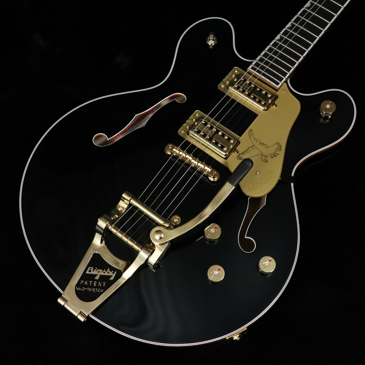 待ち望まれていたダブル・カッタウェイのファルコンが限定モデルにて登場！Gretsch Professional Collectionは、クラシックなグレッチサウンドと現代的なパフォーマンス機能を融合させ、演奏体験をさらに向上させるシリーズです。フラッグシップのピックアップとエレクトロニクスを搭載し、力強いサウンド、圧倒的な汎用性、そして卓越したコントロール性を実現しています。Limited Edition Falcon Center Blockは、由緒あるファルコンモデルに新たな息吹を吹き込んだ一本です。TV Jones ClassicおよびClassic Plusピックアップ、再設計されたChannel Coreセンターブロック、さらにハイポジションへのアクセスを改善するディープカッタウェイデザインを採用し、卓越した演奏性と極上のサウンドを実現します。＜ハイライト＞■ 再設計されたChannel Coreセンターブロックメイプルトップとスプルースボトムを組み合わせたチェンバード構造により、速い音の立ち上がりと強化されたミッドレンジが得られます。■ ディープカッタウェイを備えた洗練されたボディデザイン深いカッタウェイによってハイポジションへのアクセスが大幅に改善され、よりスムーズで快適な演奏を実現します。■ TV JonesピックアップTV Classicネックピックアップは、クリーンでコンプ感のあるハイ＆ミッドと、タイトなローエンドを提供します。TV Classic Plusブリッジピックアップは、より丸みのある高出力なハイエンドが特徴です。■ ロールオフ処理された指板エッジのメイプルネック24.6インチスケールの”U”シェイプメイプルネックは、22本のミディアムジャンボフレットを採用したロールオフ処理済み12インチラジアスエボニー指板を備え、快適でスムーズな演奏性を提供します。また視認性の高い蓄光式Luminlayサイドドットは暗いステージ上でも高い視認性を誇り、フレットポジションを容易に確認できます。 ■重量：4.07kg■JAN：0885978529766■付属品：ハードケース、調整用レンチ、メーカー保証書 ※こちらの商品は現物1点限りを、店頭展示を含め複数のモールに同時掲載しております。 売却に伴う商品情報の削除は迅速を心掛けておりますが、必ずしもリアルタイムではございません。 ご注文後に万一売り切れとなっておりました際は、誠に申し訳ございませんがご容赦くださいませ。 製品仕様 ModelFalcon Center Block LTD with String-Thru Bigsby and Gold Hardware Ebony FingerboardBody MaterialLaminated MapleBody FinishGlossNeckMaple, Standard “U”Neck FinishGlossFingerboardEbony, 12” &#40;305 mm&#41;Frets22, Medium JumboPosition InlaysPearloid Neo-Classic ThumbnailNut Material/WidthGraph Tech TUSQ, 1.6875” &#40;42.86 mm&#41;Tuning MachinesGrover Imperial LockingScale Length24.6” &#40;625 mm&#41;BridgeAdjusto-MaticPickguardGold Plexi with Gold Gretsch Logo and Falcon GraphicPickupsTV Jones TV Classic Plus &#40;Bridge&#41;, TV Jones TV Classic &#40;Neck&#41;Pickup Switching3-Position Toggle ControlsVolume 1. &#40;Neck Pickup&#41;, Volume 2. &#40;Bridge Pickup&#41;, Master Volume, Master ToneControl KnobsJeweled G-ArrowHardware FinishGoldStringsNickel Plated Steel &#40;.010-.046 Gauges&#41;Case/Gig BagIncluded