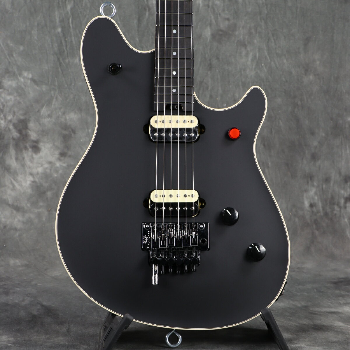 USA製のWolfgang人気カラー、ステルスブラックが遂に入荷！ Wolfgang USA Edward Van Halen Signatureモデルは、エディ・ヴァン・ヘイレンの最新スペックを搭載し、クラシックなルックスと壮大なスケールのサウンドを実現します。 バスウッドボディにビッグリーフメイプルトップと5plyバインディングをあしらい、エディの精密なスペックに合わせて製造されたボルトオン式クォーターソーンメイプ ルネックはグラファイト補強され、手作業によるバックサテン仕上げにフィニッシュすることで滑らかなプレイアビリティを実現。12インチ〜16インチコンパウンドラジアスのエボニー指板には22本のヴィンテージステンレススチールフレット、パーロイド（アイボリーフィニッシュ）またはドット（ステルスフィニッシュ）のインレイ、そしてヒールマウントのトラスロッド調整ホイールが装備されています。 ブリッジにはカスタムワウンドのAlnico 2 EVH Wolfgang Humbucker、ネックには新たに追加されたカスタムワウンドAlnico 3のEVH Wolfgang Humbuckerが搭載されており、リバース3ウェイトグルスイッチで切り替えが可能です。赤ボタンのキルスイッチで "You Really Got Me "のようなスタッターストップと、EVHハイフリクショントーンポット、EVH "HPU（ハイパフォーマンスアップグレード）"カスタムローフリクションボリュームポットのおかげで、"Cathedral"で聴けるような滑らかなボリューム奏法が可能です。 安定したEVHブランドのFloyd Rose Locking Tremoloシステムは、激しいアーム奏法でも正確なチューニングを実現し無限のサスティーンが得られます。EVH D-Tunaは、シンプルな操作でDrop-Dチューニングに切り替えることが可能です。 エレガントでクラシカルなスタイルを誇るアイボリーまたはステルスの2カラーをラインナップ。ハードシェルEVHストライプSKBケースとEVHレザーストラップが付属されます。 付属品：ハードケース、トレモロアーム、調整用レンチ、メーカー保証書 ■シリアルナンバー:WG17619A ■重量:　3.54kg ※実物画像を掲載しておりますが、モニター環境によっては若干色合い・明るさが違って見える場合がございます。予めご了承くださいませ。 主な仕様 ■Neck ヘッドストック:EVH Wolfgang ネック:Quartersawn Maple ネックフィニッシュ:Hand-Rubbed Satin Urethane ネックシェイプ:Wolfgang Backshape ネック:Bolt-On with Graphite Reinforcement ネックの太さ:.805" at 3rd &amp; .890" at 12th Fret フィンガーボードラジアス:12"-16" Compound Radius (304.8 mm to 406.4 mm) FINGERBOARD MATERIAL:Ebony ポジションインレイ:Pearloid Dot フレット数:22 トラスロッド:EVH-Branded with Wheel トラスロッドナット:Heel-Mount Truss Rod Adjustment Wheel ナット:Floyd Rose R2 Locking ナット幅:1.650" (42 mm) ナットの素材:Floyd Rose R2 Locking ■ボディ ボディ:Basswood ボディフィニッシュ:Satin Urethane ボディシェイプ:Wolfgang ボディトップ:Big Leaf Maple ボディバインディング:5-Ply ボディバック:Basswood ボディ素材:Basswood ■Hardware ブリッジ:EVH-Branded Floyd Rose Locking Tremolo with EVH D-Tuna TREMOLO BLOCK:Brass PICKUP COVERS:Zebra コントロールノブ:Black Knurled with White Indicator SWITCH TIP:Black ハードウェアフィニッシュ:Chrome チューニングマシーン:EVH-Branded Gotoh STRING TREES:Floyd Rose Retainer Bar ストリング:EVH Nickel Plated Steel (.009-.042 Gauges) TREMOLO ARM:Floyd Rose 1000 Series Locking STRAP BUTTONS:Eye Hook ■Electronics ブリッジピックアップ:Direct Mount EVH Wolfgang Humbucking ネックピックアップ:Direct Mount EVH Wolfgang AL3 Humbucking ピックアップコンフィギュレーション:HH コントロール:Volume (EVH BI Tech HPU Low Friction Pot) with Treble Bleed Circuit, Tone (250K EVH Bourns High Friction Pot) SWITCHING:EVH Reverse-Style 3-Position Switching: Position 1: Neck Pickup, Position 2: Neck and Bridge, Position 3: Bridge AUXILIARY SWITCHING:Kill Switch