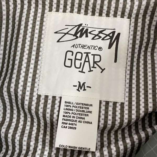 もございま STUSSY ステューシー ジャンパー、ブルゾン ジャケット、上着 Jacket stussy authentic gear/グラフチェック柄/ナイロンジャケット/カーキ/M10062881:ドンドンダウンIS ください
