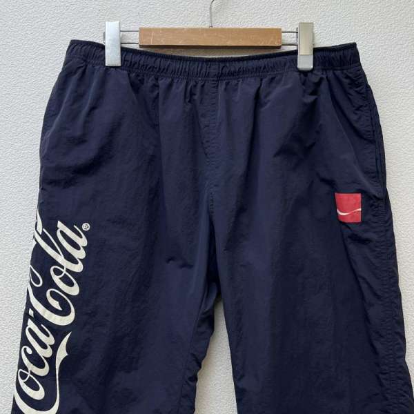 アトモスラボ Coca-Cola コカコーラ ロゴ プリント ナイロン トラックパンツ XXL【USED】【古着】【中古】10094182