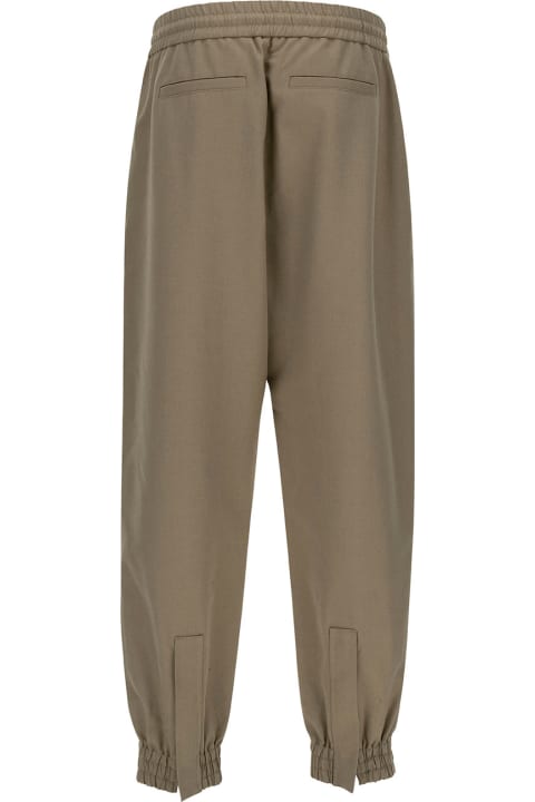 Alexander McQueen スウェットパンツ コットンマンの伸縮性ウエストバンド付きベージュカーゴパンツ