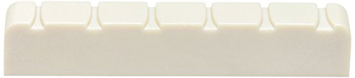 -/-/PQ-6220-00・パッケージ個数:1・長さ：50.85mm (2インチ)・厚み：6.38mm (1/4インチ)・高さ：9.45mm (3/8インチ)・弦間：1弦から6弦まで41.50mm (1 5/8インチ)・素材：TUSQ 人工象牙ナット幅50.85mm(2インチ)のあらゆるクラシックギターに適合します。 TUSQは摩耗に強く、弦滑りの良さからチューニングの安定性が高いのが特徴です。 成形済みですが、若干の加工が必要な場合があります。取り付けの際はリペアショップにご依頼ください。 TUSQはギターの弦の周波数帯域を無駄なく最大限に引き出し、澄んだ高音から深みのある低音まで幅広いサウンドを得ることができます。 高音・高圧で精密に製造された、TUSQは、自然素材の牛骨や象牙と違い100%一定品質です。 TUSQを使えばリッチな音色、ハーモニクス成分の持続が可能に。 世界中のギタリストやギタービルダーに一番信頼されているナットとサドルのシリーズです。