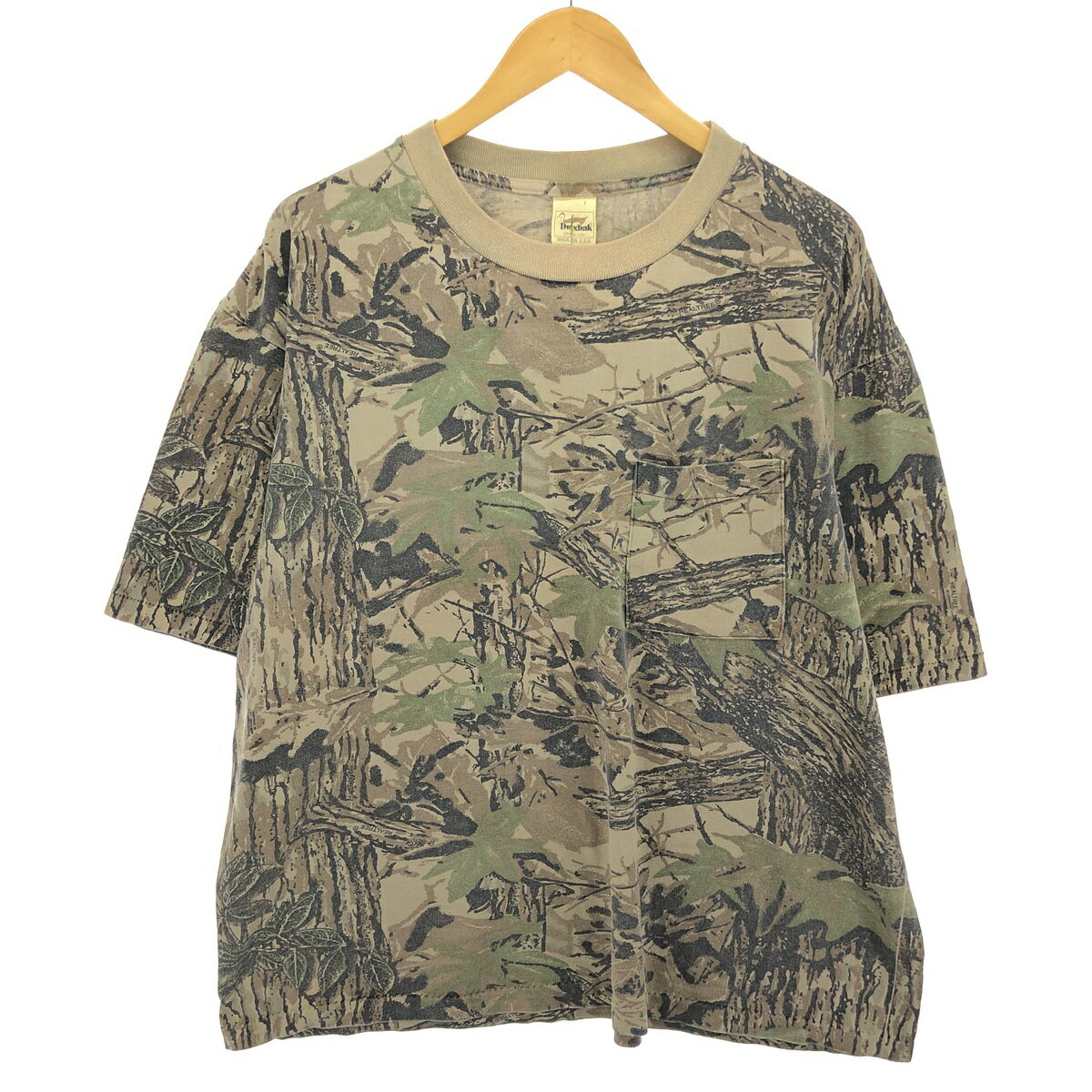 商品詳細 ブランド・Duxbak・ 特徴・クルーネック(丸首)・半袖・シングルステッチ・ヴィンテージ・ モデル/形状・迷彩 ポケットTシャツ・ 素材・コットン:100%・ 色・カーキ系・ブラウン系 茶色・ベージュ系 ブラウン・ 柄・迷彩柄・リアルツリーカモ・ 生産国・USA製・ 年代・90年代・ サイズ・表記サイズ:XL・着丈:64.5cm・身幅:62.5cm・肩幅:57.5cm・袖丈:25cm・ コンディション・B・ カテゴリ・メンズ・トップス・Tシャツ・その他Tシャツ・ 商品番号・eaa456491・ 取扱店・ネットショップ・ スタッフコメントDuxbak 迷彩 ポケットTシャツ / 商品番号 eaa456491 USEDですので使用感などございますが、まだまだご愛用していただけます。 古着という事をご理解の上ご注文よろしくお願いします。 【状態追記】 ●前、首周りに汚れ ●前、左脇にピンホール ●後、首周りに汚れ ●内側、後左裾ステッチ糸抜け ●内側、首周りに汚れ※状態は当社独自の基準です。 表記サイズ着丈身幅肩幅袖丈 XL(※着用感、表記サイズは目安です。)64.5cm62.5cm57.5cm25cm ※測定値の若干の誤差はご了承下さい。サイズガイドはこちら ブランドDuxbak 特徴クルーネック(丸首) / 半袖 / シングルステッチ / ヴィンテージ モデル/形状迷彩 ポケットTシャツ 素材コットン:100% 色カーキ系 / ブラウン系 茶色 / ベージュ系 ブラウン 柄迷彩柄 / リアルツリーカモ 生産国USA製 年代90年代 カテゴリミリタリーTシャツ 商品番号eaa456491 取扱店ネットショップ 　　 Duxbakの他の商品を見るミリタリーTシャツの他の商品を見る