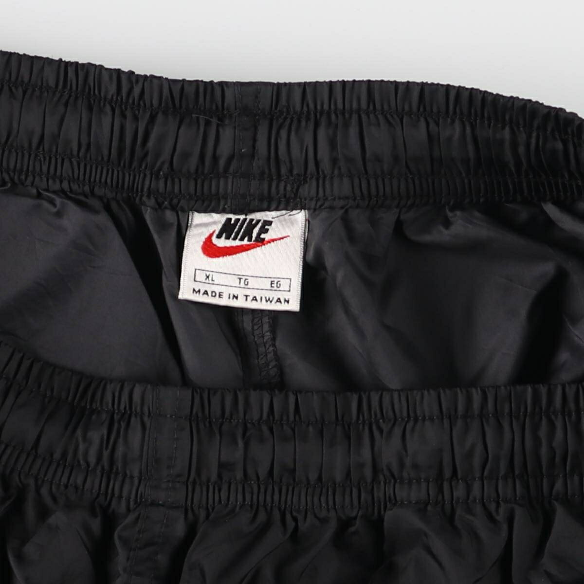 古着 90'S ナイキ NIKE ナイロンパンツ シャカシャカパンツ メンズXL相当 ヴィンテージ /eaa532369 【中古】 【250330】