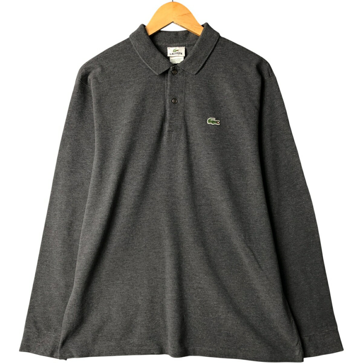 商品詳細 ブランド・LACOSTE・ラコステ・ 特徴・レギュラーカラー・長袖・ モデル/形状・長袖 ポロシャツ・ 素材・コットン:100%・ 色・グレー系 灰色・ 柄・無地・ワンポイント・ 生産国・ペルー製・ 年代 サイズ・メンズXL・表記...