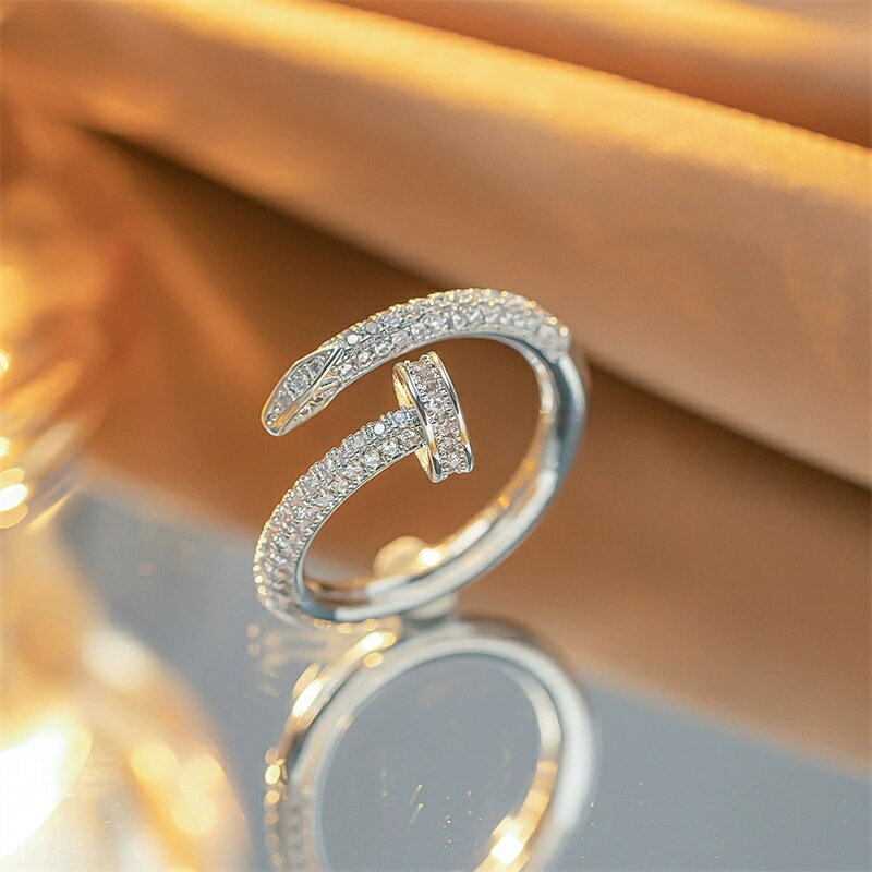 Rakuten - クローザ 指輪 レディース ステンレス 釘 ジルコニア ストーン入り リング ピンキーリング 鏡面仕上げ 光沢感 シンプル 上品 華奢 指輪 金属アレルギー対応 おしゃれ くぎ クギ ネイル モチーフ ファッション ギフト 巾着