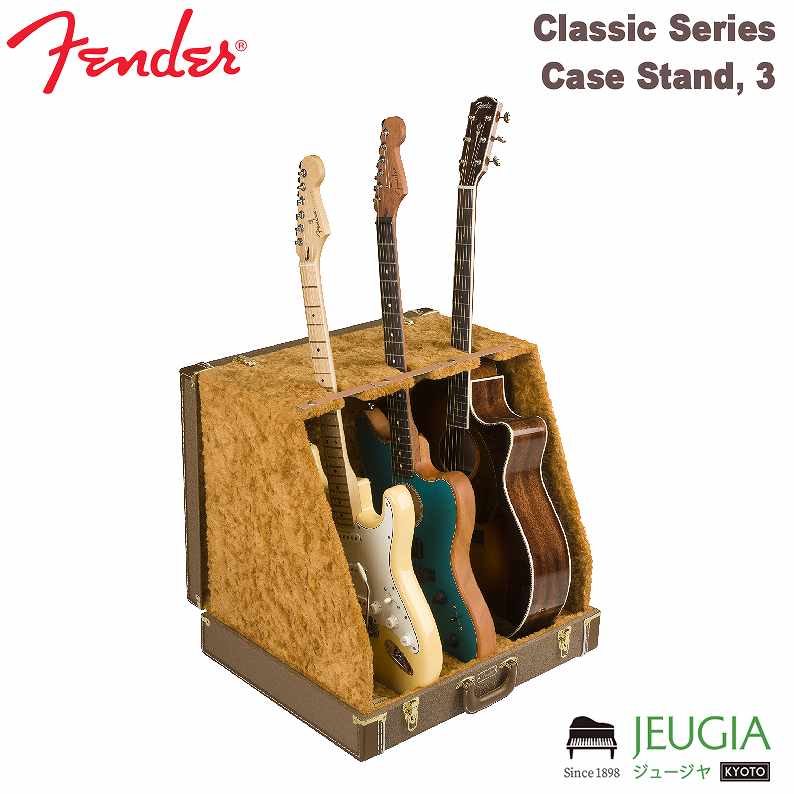 FENDER/Classic Series Case Stand, 3 Fender Instrument Case Standsは、複数本の楽器を保護、そしてディスプレイするのに便利なアクセサリーです。一見トラディショナルなルックスのケースは、組み立てると見栄えもラグジュリアスなギタースタンドに返信します。3-plyハードシェルウッドケースにビニールラッピングされた把手部とスチールラッチを装備し、持ち運びも楽に行えます。内部は柔らかなアクリル生地に覆われており、大切な楽器に傷を付けることなく陳列いただけます。 外装：耐久性の高いビニール製またはツイード貼り 内装：黒／赤のソフトなプラッシュ 丈夫な掛け金 エレクトリックギター3本まで収納可能 ※商品の汚れや状態はお問い合わせ下さい。 ※掲載の商品は店頭や他のECサイトでも並行して販売しております。在庫情報の更新には最大限の努力をしておりますが、ご注文が完了しましても売り切れでご用意できない場合がございます。 その際はご注文をキャンセルさせていただきますので、予めご了承くださいませ。 また、お取り寄せ商品の場合、生産完了などの理由でご用意できない場合がございます。 ※お届け先が北海道や沖縄、その他離島の場合、「送料無料」と表記の商品であっても別途中継料や送料を頂戴いたします。その際は改めてご連絡を差し上げますのでご了承ください。