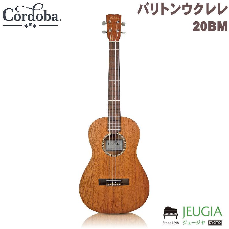 Cordoba/20BM 20BM はソリッド・マホガニートップとマホガニーバック＆サイドを採用したバリトンサイズのウク レレです。ハンドメイドの伝統的な木製のパターンロゼッタとサテン仕上げの美しさが魅力。初心者 だけでなく、多くの方にきっとご満足いただけるモデルです。 バリトンサイズ アンサンブルの幅と音の厚みを広げるバリトンサイズウクレレです。深く温かい低音はアンサンブルと楽曲全体を優しく包み込みます。 単板トップ ウクレレでは定番の木材であるマホガニーを使用し、ふくよかでウクレレらしいサウンドを奏でます。また単板ならではの音を育てる楽しみも味わえます。 ギグバッグ付属 しっかりとしたクッションとおしゃれな見た目のバッグが付属します。別途バッグをご用意いただく必要はありません。 トップ材ソリッドマホガニー バック＆サイドマホガニー ブリッジローズウッド ロゼッタ木製ヘリンボーンパターン フィニッシュサテン ネック材マホガニー フィンガーボード材ローズウッド ナット幅ナット幅 ナット/サドルBone フレット数19 フレット ボディ上部幅193mm ボディ下部幅254mm 全長775mm ボディ上部厚み65mm ボディ下部厚み80mm 糸巻きCordoba Nickel with Pearl Buttons 付属バッグ/ケースStandard Cordoba gig bag ※商品画像はサンプルです。 ※商品の汚れや状態はお問い合わせ下さい。 ※掲載の商品は店頭や他のECサイトでも並行して販売しております。在庫情報の更新には最大限の努力をしておりますが、ご注文が完了しましても売り切れでご用意できない場合がございます。 その際はご注文をキャンセルさせていただきますので、予めご了承くださいませ。 また、お取り寄せ商品の場合、生産完了などの理由でご用意できない場合がございます。 ※お届け先が北海道や沖縄、その他離島の場合、「送料無料」と表記の商品であっても別途中継料や送料を頂戴いたします。その際は改めてご連絡を差し上げますのでご了承ください。