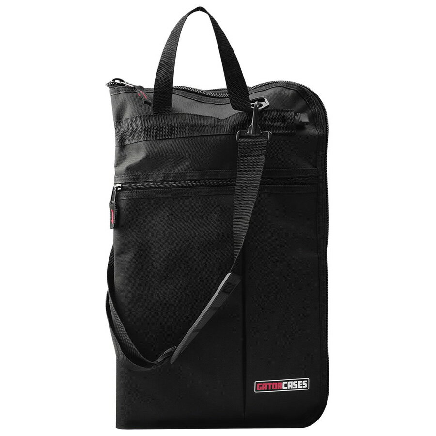 【返品種別A】□「返品種別」について詳しくはこちら□※画像は使用イメージです。本製品にはスティックおよびマレットは含まれておりません。パーカッショニストの必需品 — 必要なツールをいつでも手元にGator Standard Stick and Mallet Bagは、スティックやマレットなどのパーカッションツールを整理・収納できる、スタンダードなスティックバッグです。8つのポケットを備え、演奏中やリハーサル時でも必要なツールをすぐに取り出せる設計。ハンギングループと引きひも付きで、マレットキーボードやドラムへの取り付けも簡単です。頑丈なナイロン素材がスティック類をしっかり保護し、持ち運びにも安心。初心者からプロフェッショナルまで、あらゆるパーカッショニストにおすすめのモデルです。◆耐久性の高いファブリック素材を採用し、日常の持ち運びや使用にも安心◆8つのポケットでスティック、マレット、各種パーカッションツールを安全に収納◆ハンギングループ付きで、マレットキーボードへの取り付け・取り外しが簡単◆引きひも（リトラクタブル・コード）により、フロアタムなどへの吊り下げもスムーズ◆大型外ポケットを装備し、楽譜、教本、アクセサリー類を収納可能◆ショルダーストラップ付きで、快適に持ち運びが可能■　仕　様　■寸法（約）：長さ52.71×幅60.96×高さ1.91cm重量（約）：0.73kg[GPSTICKBAGSTD]ゲーター楽器・レコーディング＞ドラム/パーカッション＞ドラムアクセサリー