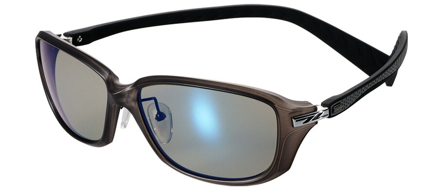 【返品種別A】□「返品種別」について詳しくはこちら□メーカー保証期間 1年◆躍動するラージシルエット、広がる視界、深まる集中。TIDAのフロントデザインを一回り大きく再設計。目元をカバーするように覆い、外光の侵入を抑える大型フロント。周辺視野まで鮮明に捉える広い視界。頭部を包み込むような掛け心地のロングテンプルが、グリップ効率と重量バランスを両立。ラージシルエットながらズレを感じさせない軽さとフィット感で、躍動するスポーツシーンに。◆レンズカラー：トゥルービュースポーツ自然な色合いとコントラストの絶妙なバランス。様々なフィールドに。自然な見え方のトゥルービューに物体の輪郭を強調するコントラスト性能を付加。視界の色調変化を極力抑えたまま、アングラーに必要な情報が見やすくなるオールマイティーな使用感は、様々なフィールドでストレスの無い視界を確保する。◆明るくクリアで眩しくない鮮明な視界ただ暗く光を遮るサングラスとは異なり、見えていなかったディテールまで鮮やかに。強い陽射しなどの自然光の眩しさを和らげながら、有害な紫外線や視界を妨げる反射光をカット。アウトドアやフィッシングでは水面や雪面の乱反射を、ドライブでは路面の照り返しやフロントガラスへの映り込みなど様々な反射光を抑え、高性能偏光フィルターが目に優しい光だけを通す偏光レンズのクリアな視界。最高水準の解像力と軽さを高品質な日本製偏光レンズを採用紫外線などの有害な光や不意のアクシデントから目を保護するために偏光サングラスは欠かせない。しかし長時間、目を酷使する過酷なフィールドではいかに疲れを軽減できるかが重要になる。そして一瞬の動きを捉えてわずかな変化を見逃さないために、求められているのはハイレベルな解像力。ZEQUEは軽さと見え方の質にこだわった高品質な日本製の偏光レンズを採用し、機能を高めるコーティングを全ての製品に完備している。TALEX CR-39 Polarized (PPL75)高性能偏光フィルターと透明感溢れる液体素材で形成。優れた光学性能と軽さ、透明度の高いクリアな視界が特徴のCR-39製偏光レンズ。揺れや歪みがなく目に優しい視界が長時間の使用でも疲れを軽減。有害な紫外線を99.9％以上ブロックし、高度な染色技術で可視光線域の光をバランスよくカット。通常のポリカーボネイト偏光レンズ量産偏光フィルターと固形原料を高熱で液化した素材で形成。透明度に劣るポリカーボネイト製の偏光レンズは650nm付近の赤色波長の可視光線を透過し、水面の波頭などがギラつく赤抜け現象が起こる。内面反射や傷防止、撥水効果 機能を高めるコーティングを完備レンズ表面に幾層もの薄膜を重ねて多層膜を形成するレンズコーティング。全てのレンズ表層にナノレベル技術で高い密着性を誇る超撥水コートを施すことで、摩擦係数が大幅に向上。フィッシングやアウトドアでは避けられない雨や海水などの水滴を風圧で弾き落とし、細かな砂埃や花粉などの付着を軽減。抜群の撥水効果で快適な視界を長時間キープする。ハードマルチコート傷を防止して耐久性を高めるハードコート。内面反射や映り込みを防ぎ、透過率を上げるマルチコート。二種類のコーティングをレンズの表裏両面に採用。ハードマルチミラーコートハードコートに加えて表面にミラーコート、裏面にマルチコートを採用。ミラーの反射で外部から目が透けて見えにくくなり、可視光線透過率が約3％低下。実績あるレンズバリエーション多彩なシーンに応えフィールドの変化を読む、実績あるレンズバリエーション。豊富なレンズカラーから自信のスタイルや環境に合わせて最適なレンズをセレクト。各レンズの特性を知り、刻々と移りゆく状況に合わせて巧みに使い分けることで、意のままにならない自然との対話をより支えてくれるだろう。想像するしかなかった水面や水中の様子がわかる、魚が見える想像するしかなかった水面や水中の様子がわかる、魚が見える。各レンズの表記で「可視光線透過率」はレンズが自然光を通す割合を表し、この数値が大きいほど光をよく通す明るいレンズ。「偏光度」は反射光をカットする割合を表し、可視光線透過率に反比例するためレンズカラーが濃く暗いほど偏光度は高く、レンズカラーが薄く明るいレンズほど高い偏光度を保つことが難しくなる。■　仕　様　■フレーム：ナイロン ＆ βチタン ＆ シリコンラバーレンズ：TALEX(タレックス) CR-39 Polarizedレンズコート：ハードマルチミラーコートレンズカーブ：6カーブサイズ：60□17-155(62×42)偏光度：99％以上可視光線透過率：30％紫外線カット率：99％以上付属品：ハードケース、メガネ拭き[F2302ZEQUE]ZEQUEアウトドア＞フィッシング＞ウェア・帽子・靴＞アクセサリー