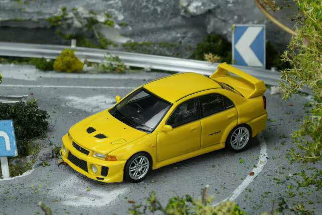 モーターへリックス 1/64 三菱 Lancer EVOLUTION V GSR Dandelion Yellow【M64102】 ミニカー