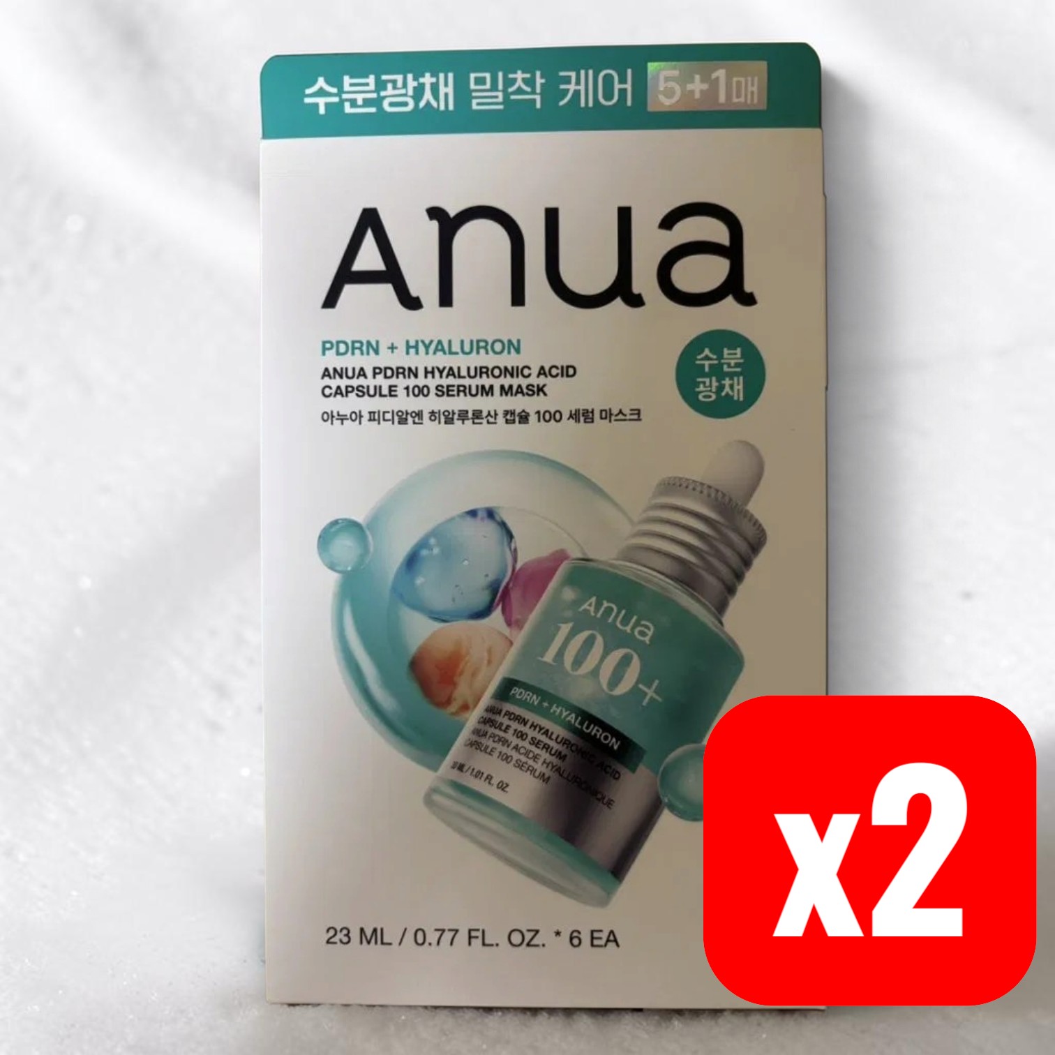Anua / アヌア PDRN ヒアルロン酸 カプセル100 セラムマスク 23ml×6枚入 【2セット（12枚）】 正規品保証　｜　発送後4〜6日以内到着　｜　韓国から発送 肌にぴたっと密着、水分ツヤをチャージ 人気セラム「PDRN ヒアルロン酸 カプセル100 セラム」の成分を詰め込んだ、1枚たっぷり23mlのシートマスクです。 セラムの成分をたっぷり含んだウォータージェルシート 韓国で人気のAnua（アヌア）「PDRN ヒアルロン酸 カプセル100 セラムマスク」は、PDRN・ヒアルロン酸・コラーゲンを配合したセラムをたっぷり含ませたシートマスクです。肌の凹凸にぴったり密着する超薄型のウォータージェルシートで、うるおいとツヤのある肌へ導きます。 ★ PDRN × ヒアルロン酸 × コラーゲン PDRN（DNA-Na）、ヒアルロン酸、コラーゲンを配合。1枚23mlのたっぷりセラムで、10〜20分のパックで肌をうるおいで満たします。2セットなら、毎日のケアも安心です。 PDRN配合 ヒアルロン酸配合 コラーゲン配合 人気セラムの成分を凝縮 うるおいをチャージ みずみずしいハリ感のある印象へ 使い方 1. 洗顔後、トナーで肌を整えます。2. シートマスクの保護フィルムを外し、お顔にぴったりと密着させます。3. 10〜20分後にシートをはがし、軽くたたくようになじませて、残った美容液を肌に浸透させます。 商品情報 ブランドAnua（アヌア） 商品名PDRN ヒアルロン酸 カプセル100 セラムマスク セット内容6枚入 × 2箱（計12枚） 内容量23ml／1枚（1箱6枚入） 主な成分PDRN（DNA-Na）、ヒアルロン酸、加水分解コラーゲン、ナイアシンアミド、アデノシン、パンテノール、アラントイン ほか 製造国韓国 区分化粧品 ★ 2セット：6枚入×2箱、合計12枚でお届けします。まとめ買いでお得です！ ご使用上の注意 化粧品の使用中または使用後に、直射日光により赤み、はれ、かゆみ等の異常が現れた場合は使用を中止し、専門医にご相談ください。傷やはれもの、湿疹等異常のある部位にはお使いにならないでください。目に入った場合はすぐに水で洗い流してください。開封後はお早めにご使用ください。乳幼児の手の届かない場所に、直射日光を避けて保管してください。 【ご購入前に必ずご確認ください】 本商品は韓国からの国際配送となります。ご注文の際は必ず「個人名・個人住所」でご注文ください（法人名・会社住所では通関できない場合がございます）。 ご注文確定後、2営業日以内に発送いたします。発送日より最短4〜7日程度でお届けの予定です。 配送追跡は、日本の税関を通過し、国内の配送会社へ引き渡された後からご利用いただけます。※それ以前は追跡情報が表示されない場合がございますが、発送は完了しておりますのでご安心ください。 万が一、偽物であった場合は全額返金いたします。100%正規品のみ取り扱っております。 メーカーの仕様変更により、パッケージデザインが予告なく変更される場合がございます。また、まれに内容成分がより良くなるよう改良される場合もございますが、商品名および基本的な品質・効果に変わりございませんので、どうぞご安心くださいませ。 発送の際、外箱（化粧箱）を取り外し、マスクパック（個包装）のみでお届けする場合がございます。予めご了承ください。 在庫状況により、ご注文後に商品の確保ができない場合がございます。その際は速やかにご連絡し、全額返金いたします。 日本国内への送料は無料です。沖縄県へのお届けのみ追加送料が発生いたします。 本商品は並行輸入品ですが、関税・消費税が発生しないよう適切な方法で発送しております。 商品の性質上、お客様都合による返品・交換はお受けできない場合がございます。ただし、商品に瑕疵がある場合はご対応いたします。 天候・税関検査・繁忙期等の影響により、お届けが遅延する場合がございます。予めご了承ください。