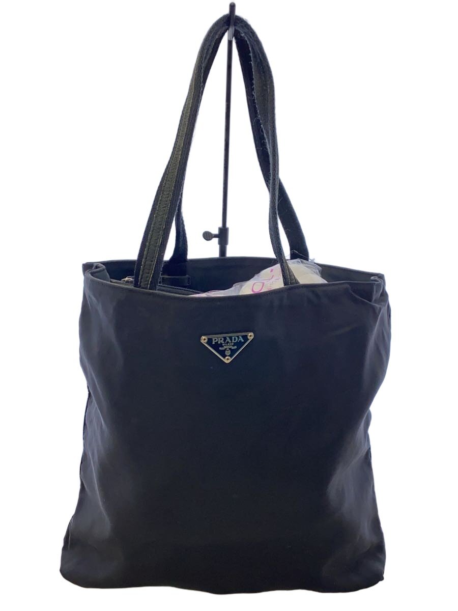 【ブランド】PRADA 【ブランドカナ】プラダ 【型番】 【程度】C 【サイズ】 【メインカラー】ブラック 【素材・生地】ナイロン 【キーワード】　　 2026/04/03 セカンドストリート大和高田店【3002】【中古】PRADA◆トートバッグ/ナイロン/BLK【バッグ】 ブランド PRADA 型番 カラー ブラック 柄 素材・生地 ナイロン>色・素材について サイズ >サイズ表示について 実寸（cm） 【バッグ】 マチ：6 / 高さ：28 / 幅：29 / 持ち手：47.5 【その他】 その他サイズ：/ 商品は　セカンドストリート大和高田店の店頭にて販売しております。商品に関するお問合わせは、お電話(TEL:0745-24-5485)にて、問合わせ番号：2330025509751をお伝えください。 配送方法やお支払い方法に関するお問い合わせは、サポートセンターまでご連絡をお願いします。 ※お電話の対応は営業時間内のみとなります。お問い合わせフォームでお問い合わせの際はご注文番号をご記入下さい この商品に関する出品店舗からのコメント お汚れ有り。全体的に使用感が御座いますが、その分お買い求めやすくなっております。リユース商品になりますので、 ご了承の上、ご検討下さいませ。