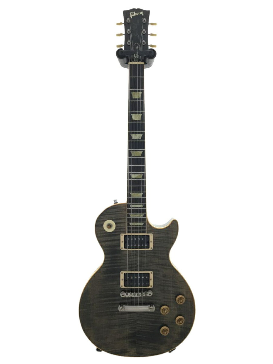 【ブランド】Gibson【ブランドカナ】ギブソン【型番】【程度】B【カラー】黒系【キーワード】　　2023/09/02セカンドストリート越谷レイクタウン店 【3311】【中古】Gibson◆Les Paul Classic Plus/Trans Ebony Burst/2001ブランドGibson型番カラー黒系実寸【エレキギター】 スケール：622mm / ナット幅：42mm / フレット数：22 【その他】 その他サイズ：/商品は　セカンドストリート越谷レイクタウン店の店頭にて販売しております。商品に関するお問合わせは、お電話(TEL:048-990-3588)にて、問合わせ番号：2333112397071をお伝えください。配送方法やお支払い方法に関するお問い合わせは、サポートセンターまでご連絡をお願いします。※お電話の対応は営業時間内のみとなります。お問い合わせフォームでお問い合わせの際はご注文番号をご記入下さいこの商品に関する出品店舗からのコメント内部デイトよりトランス・エボニー（ブラック）サンバースト、仕様よりLPクラシック・プラスと思われます。　ネック折れの補修跡があり、ボリュート（補強用コブ）がつけられています。塗装色に大幅な褪せが、全体的に目立つ複数のあてキズがみられます。トラスロッドの効きは良好ですがフレットは全体的に消耗しており、平均して6割の残りですのでセッティングによっては専門的な修正が必要になる場合があります。番号錠が破損し外装に傷みがありますがハードケースが付属します。重量は約4kgです。