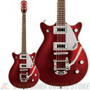 G5232T Electromatic? Double Jet FT with Bigsby は、Jetならではの卓越したパワーとサウンドを提供します。 ダブルカッタウェイのチェンバードマホガニーボディとアーチドメイプルトップのトーンウッドコンビネーションにより、豊かなローエンドとミッドレンジ、そして明確かつシルキーなハイエンドに特徴付けられる、ラウドでクリアなクラシックJetトーンが得られます。 このサウンドこそが、多種多様なトーンにも対応する、力強くバランスの取れたサウンドの基礎を形成します。 Black Top Filter?Tronピックアップは、Electromatic Double Jet FTのチェンバードボディサウンドを増幅し、スケール感のある、バランスの取れたクリアなトーンを生み出します。 ラウドでパンチの効いたサウンドは、あらゆるゲインレベルで輪郭を失わず、明瞭なトーンを維持します。 3ポジショントグルスイッチで切り替えられるの2基のピックアップは、ボリュームコントロール、マスタートーン、マスターボリュームとトレブルブリード回路の組み合わせにより、ピックアップとトーンの設定を直感的かつ包括的にコントロールすることが可能です。 12インチラジアスのローレル指板には22本のミディアムジャンボフレットとパーロイドNeo-Classic サムネイルインレイを採用し、ブリッジ部には固定式Adjusto-MaticブリッジとBigsby Tremoloを装備しています。 BroadwayJade、Fairlane Blue、そしてFirestick Redの3カラーをラインナップし、いずれのカラーモデルもシルバーピックガードとクロムハードウェアをフィーチャーしています。 Body Material: Mahogany (533, 539, 540, 551, 579), Mahogany with Arched Maple Top (548, 570, 595) Body Finish: Gloss Neck: Mahogany, Thin “U” Neck Finish: Gloss Fingerboard: Laurel, 12” (305 mm) Frets: 22, Medium Jumbo Position Inlays: Pearloid Neo-Classic? Thumbnail (Laurel) Nut (Material/Width): Synthetic Bone, 1.6875” (42.86 mm) Tuning Machines: Die-Cast Scale Length: 24.6” (625 mm) Bridge: Anchored Adjusto-Matic Pickguard: Silver Plexi w/ Black Gretsch & Electromatic Logos (548, 570, 595), Silver Plexi with Black Gretsch and Electromatic Logos (533, 539, 540, 551, 579) Pickups: Black Top Filter?Tron (Bridge), (Middle), Black Top Filter?Tron (Neck) Pickup Switching: 3-Position Toggle: Position 1. Bridge Pickup, Position 2. Bridge And Neck Pickups, Position 3. Neck Pickup Controls: Volume 1. (Neck Pickup), Volume 2. (Bridge Pickup), Master Volume with Treble Bleed, Master Tone Control Knobs: G-Arrow Hardware Finish: Chrome Strings: Nickel Plated Steel (.010-.046 Gauges) Case/Gig Bag: Optional: 099-6460-000 Gig Bag - G2164 - Solid Body Electric; 099-6474-000 Economy Case - G6238FT - (Flat) Solid Body A6079/B; 099-6410-000 Deluxe Case - G6238 - Solid Body Models モデル番号：2508210595