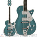 2023年、Gretschブランドは創業年から”ダブルプラチナ”となる140周年という大きな節目を迎えます。 140年にわたる確かなサウンドを祝して開発されたLimited Edition G6134T-140 Penguinは、インスピレーションに満ちたグレッチの歴史を称え、次世代のサウンドスケープを作り出すプレイヤーに優れたパワーとトーンを提供します。 主な特徴： ・ソリッドアディロンダックレッドスプルーストップのチェンバードマホガニーボディ ・22本のミディアムジャンボフレットと、マザーオブパールNeo-Classicサムネイルインレイを備えた、ロールオフ処理済み12インチラジアスエボニー指板 ・FT-67 Filter?Tronハムバッカー ・エボニーベースのAdjusto-Maticブリッジ ・ストリングスルー式のBigsby B3CPテイルピース ・Grover Imperialロッキングチューナー ・140周年記念ヘッドプレート ・クロムハードウェア ・ニトロセルロースラッカーフィニッシュ ・Gretschデラックスソリッドボディハードシェルケ ース付属 製品ハイライト： 【ソリッドアディロンダックレッドスプルーストップのチェンバードマホガニーボディ】 軽量ながらも高い剛性と鳴りの良さを誇るソリッドアディロンダックレッドスプルースをトップ材に使用した、チェンバードマホガニーボディを採用しています。 【フラッグシップFT-67 Filter?Tronピックアップ】 FT-67 Filter?Tronハムバッカーは、ヴィンテージGretschヴォイシングを再現しつつ、現代の演奏スタイルに合わせたトーンが得られるように設計されています。 このパワフルなピックアップは、オープンで煌めくトップエンド、艶のあるミッドレンジ、力強いローエンド、バランスの取れたハーモニクスを提供し、バンドアンサンブルで他の楽器とシームレスにブレンドする音色を実現します。 【多彩なコントロール】 各ピックアップのボリュームコントロール、マスターNo-Loadトーン、トレブルブリード回路付きマスターボリュームとを備え、直感的なサウンド設計が可能です。 【140周年記念仕様】 G6134T-140は、Pure Platinumのボディバック＆サイドにStone Platinumのボディトップを重ねたフィニッシュで、ピックガードとピックアップベゼル、G-Arrowコントロールノブ、シルバーバインディング、140周年記念ヘッドプレートが付いたマッチングヘッドストックといった特別な仕様でまとめ上げられています。 -SPEC- Body Material: Mahogany Body Finish: Gloss Nitrocellulose Lacquer Neck: Maple, Standard “U” Neck Finish: Gloss Nitrocellulose Lacquer Fingerboard: Ebony, 12” (305 mm) Frets: 22, Medium Jumbo Position Inlays: Mother of Pearl Neo-Classic Thumbnail (Ebony) Nut (Material/Width): Bone, 1.6875” (42.86 mm) Tuning Machines: Grover Imperial Locking Scale Length: 24.6” (625 mm) Bridge: Adjusto-Matic with Ebony Base Pickguard: Silver Plexi with Silver Gretsch Logo & Penguin Graphic Pickups: FT-67 Filter?Tron (Bridge), FT-67 Filter?Tron (Neck) Pickup Switching: 3-Position Toggle: Position 1. Bridge Pickup, Position 2. Bridge and Neck Pickups, Position 3. Neck Pickup Controls: Volume 1. (Neck Pickup), Volume 2. (Bridge Pickup), Master Volume, Master Tone Control Knobs: Jeweled Arrow Hardware Finish: Chrome Strings: Nickel Plated Steel (.010-.046 Gauges) Case/Gig Bag: Included G6238XL Gretsch Solid Body Hardshell モデル番号：2400514974