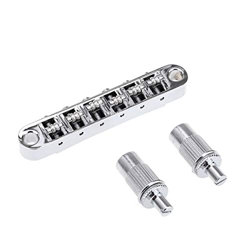 クローム/-/MX1707CR・Color:クローム・パッケージ個数:1・Epiphone Les Paul/SGと他の似ているスタイルなエレキギターに適用・弦ピッチ:10.4mm 取り付け穴の直径:6.3mm 取り付け穴の間隔:73.5mm 半径12インチ.詳しいことはサイズの画像をご覧ください・ポストネジ:M8 ブッシング外径:12mm .材質:亜鉛合金製 しっかりして耐久性に優れています・このブリッジには個々の亜鉛合金製ローラーサドルでスムーズなチューニング実現 安定性の高い「E」サドルによって弦切れが大幅に減少します・パッケージ内容:1個のギターブリッジ 2個のスタッド