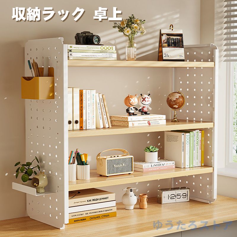 商品詳細 卓上ラックの素材】デスク上ラックは金属複合材の表面でできており、防水性、耐傷性、掃除が簡単で、耐久性があり、健康的で環境に優しく、耐荷重性が高いです。本、文房具などの小物がテーブルの周りにきれいに保管されています。 デスクトップワークスペースを最大化する必要があります。【パンチングボードエリア 】増加有孔ボード、このパンチングボードは、写真や小さなハンギングなどを飾ることができます。小物に対して優れた保管能力を持ち、デスク空間を有効に活用し、個性的な机スタイルを作ることができます。【卓上スペースを有効活用】机上ラックとして抜群の収納力を誇ります。業務や勉強などシーンでよく使われている書類、A4ファイル、文房具、カレンダー、時計とか、個人用デスクとして観賞植物、CD、漫画、スピーカーとかいっぱい置くことができます。シーンに合わせて、様々な役割を実現できます。【組み立て簡単】机上ラックはドライバーを使用して、イラストに従って組み立てることができます。女性の方も簡単に組み立てる事が可能です。何かご質問がございましたら、いつでもご連絡ください(商品には棚板と取り付け工具のみ含まれます）【多機能デスクラック】卓上収納ラックは、リビングルーム、ベッドルーム、キッチン、デスクに設置するのに最適です。 テーブルの上のロッカーは家族の本をきれいにすることができます。家の生活に欠かせない空間を広げる机棚である。●手作業での採寸となりますので、若干の誤差が生じます。