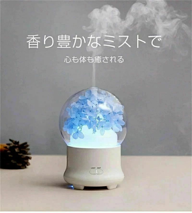 【商品詳細】 消費電力： 10Wサイズ： 120*120*168MMコード長：140cm主な素材：PP/ABS/生花連続運転時間：強運転約3時間/弱運転約6時間タイマー：1時間発振周波数：2.4MHzタンク容量： 100ML電源：DC-12V/1A使い方：付属のコードのプラグを機体ベースのDC電源ポートに差し込みます。反時計方向回転して上部の蓋を取り外します。きれいな常温の水道水を入れます。市販のアロマオイルまたはエッセンシャル（天然）オイルを2〜3滴入れます。時計回り回転して上部の蓋を取り付けます。ボタンをタップして運転開始します。注意画像はご覧になっているモニターやPCなどの環境により、実物と多少カラーが異なる場合がございます。ページに記載の通りですが、製造時期や改良などによって仕様が若干異なる場合がございますので何卒ご了承下さい。基本的には全国一律送料無料と対応させていただきますが、ご送付先は沖縄北海道など離島の場合は2000円の送料をご請求させていただきます、ご注文後追加送料があります。色味やサイズが異なるなどのクレームはご対応致しかねますので、ご了承ください。商品のサイズは採寸方法によって、若干な誤差が生じる場合はあります。ご了承ください。こちらの対応と商品について何かご不満がありましたら、「レビュー」を付ける前に一度ショップとご連絡してお願いいたします、ショップの誠意を持って最後まで対応させていただきます。品質保証◎販売している商品は全て新品未使用です、倉庫から出荷前に商品検査必要ですので、商品箱を開封する場合もございます、予めご了承くださいいませ。◎初期不良の場合は到着後3営業日以内にご連絡ください。◎初期不良の場合は写真やビデオをご提供下さい、確認後無料で新品交換もしくは御返金致しますのでご連絡下さい。◎写真やビデオをご提供出来ない場合は技術者と確認できません、返品返金対応出来ない可能性が御座います、予めご了承くださいいませ。【◎写真やビデオをご提供出来ない場合は技術者と確認できません、返品返金対応出来ない可能性が御座います、予めご了承くださいいませ。