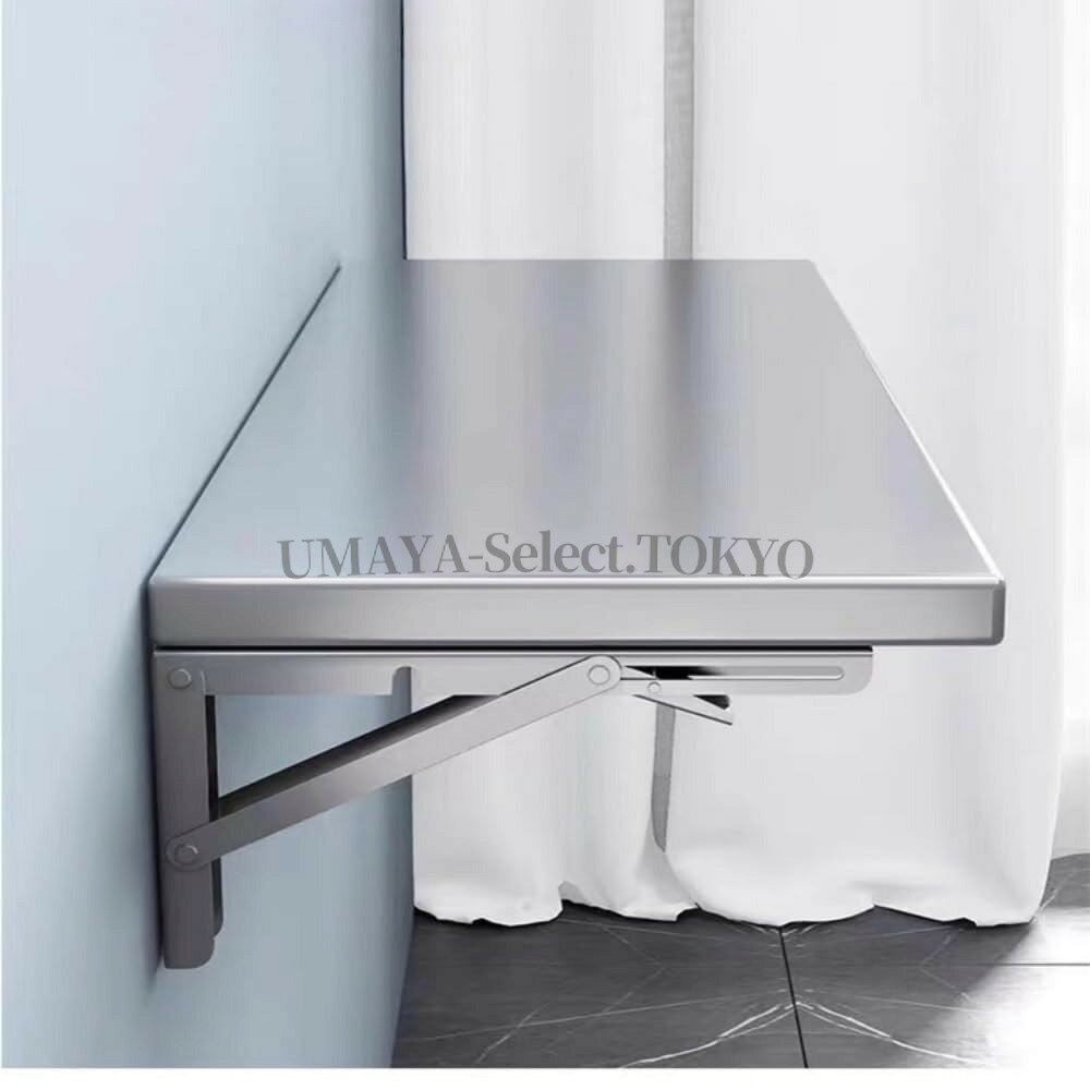 【商品名】【ポイント2倍!7月限定!店舗の人気商品!】壁掛け折りたたみテーブル 壁 ステンレス 取り付け簡単 省スペース 壁掛けテーブル 防水 ステンレス ダイニングテーブル 収納 オフィス キッチン ホーム (折りたたみ式)【価格】7761円【商品説明】【多機能な壁掛け式デザイン】折りたたみ可能なフローティングテーブルとして、キッチンシェルフやガレージ収納などに活用でき、狭いスペースでも効率的に使用可能。必要な時に広げ、不要時は畳んでスペースを大幅に節約します。【幅広い設置場所に対応】寝室、ホール、オフィス、寮、洗濯室、キッチン、教室、ガレージなど、さまざまな空間に設置可能。使用後は簡単に折りたためるため、邪魔にならず省スペースなソリューションを提供します。【高耐久ステンレス鋼素材】SUS304つや消しステンレス鋼を使用し、一体化構造で表面は滑らか。耐摩耗性耐錆性に優れ、メンテナンスが簡単で長期間の使用に耐えます。【安定した折りたたみ機構】三角形の補強構造で安定性を確保し、底部のサポートバーにより指一本で簡単に折りたたみ可能。安全性と利便性を兼ね備えています。【高強度で大容量対応】頑丈なステンレス鋼構造により、最大165ポンド（約75kg）まで耐荷重。仕事場、ダイニング、キッチン、バスルームなどで頼れる存在となり、空間効率を大幅に向上させます。製品説明小さなスペース向けに設計されたこの折りたたみ式の壁掛けダイニング テーブルは、軽量で【商品名】【ポイント2倍!7月限定!店舗の人気商品!】壁掛け折りたたみテーブル 壁 ステンレス 取り付け簡単 省スペース 壁掛けテーブル 防水 ステンレス ダイニングテーブル 収納 オフィス キッチン ホーム (折りたたみ式)【価格】7761円【商品説明】【多機能な壁掛け式デザイン】折りたたみ可能なフローティングテーブルとして、キッチンシェルフやガレージ収納などに活用でき、狭いスペースでも効率的に使用可能。必要な時に広げ、不要時は畳んでスペースを大幅に節約します。【幅広い設置場所に対応】寝室、ホール、オフィス、寮、洗濯室、キッチン、教室、ガレージなど、さまざまな空間に設置可能。使用後は簡単に折りたためるため、邪魔にならず省スペースなソリューションを提供します。【高耐久ステンレス鋼素材】SUS304つや消しステンレス鋼を使用し、一体化構造で表面は滑らか。耐摩耗性耐錆性に優れ、メンテナンスが簡単で長期間の使用に耐えます。【安定した折りたたみ機構】三角形の補強構造で安定性を確保し、底部のサポートバーにより指一本で簡単に折りたたみ可能。安全性と利便性を兼ね備えています。【高強度で大容量対応】頑丈なステンレス鋼構造により、最大165ポンド（約75kg）まで耐荷重。仕事場、ダイニング、キッチン、バスルームなどで頼れる存在となり、空間効率を大幅に向上させます。製品説明小さなスペース向けに設計されたこの折りたたみ式の壁掛けダイニング テーブルは、軽量で