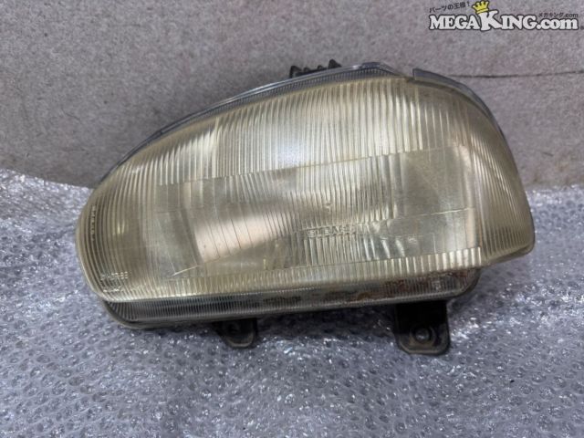 【中古】KK3 ヴィヴィオ 純正 ノーマル ハロゲン ヘッドランプ ヘッドライト 左側 助手席側 ICHIKOH 1471 L / 2T5-875