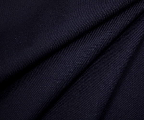 中厚程度でややハリのある日本製上質ウール ポリエステル混サージ 先染めダークネイビー 無地 ツイル (綾織り) 生地 w巾150cm 防縮加工 布 布地 服地 通販 ウール生地 毛 中肉 濃紺 50cm以上10cm単位カット