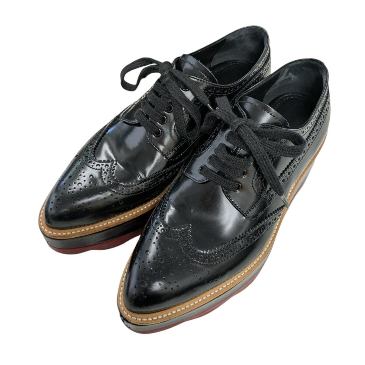 【超美品】PRADA プラットフォームシューズ 厚底 ウィングチップ 38.5 PRADA 厚底 ウィングチップシューズ プラットフォームシューズ 黒