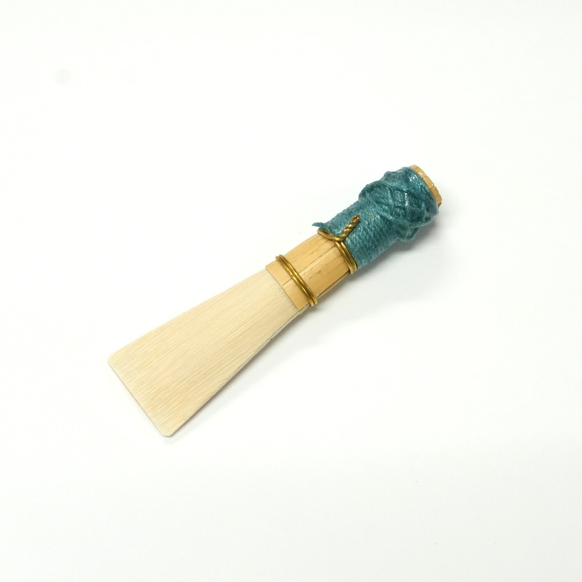 ファゴットの完成リード 糸：ターコイズ 硬さ：M