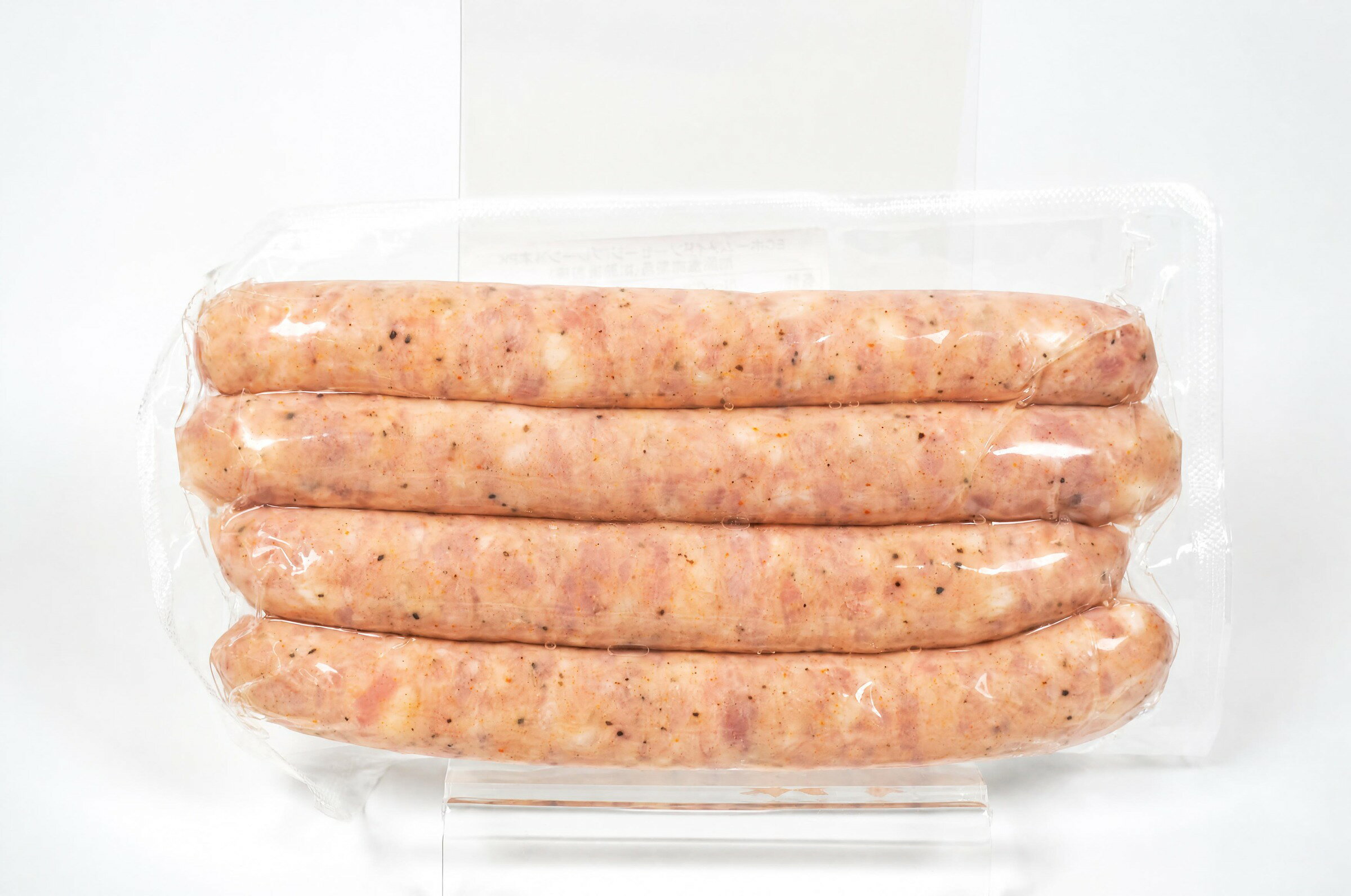 肉々しい食感が楽しめる、粗挽きタイプのソーセージです。 羊腸を使用しており、パリッとした歯切れの良い食感と、粗挽きならではのジューシーな肉の旨みをお楽しみいただけます。 ホットドッグやオードブル、そのまま焼いておつまみとしてもご使用いただけます。 キャンプやアウトドア、バーベキューにも最適！！ 1本当たりサイズ【重量約50g/長さ約17cm/太さ約2cm】肉々しい食感が楽しめる、粗挽きタイプのソーセージです。 羊腸を使用しており、パリッとした歯切れの良い食感と、粗挽きならではのジューシーな肉の旨みをお楽しみいただけます。 ホットドッグやオードブル、そのまま焼いておつまみとしてもご使用いただけます。 キャンプやアウトドア、バーベキューにも最適！！ 1本当たりサイズ【重量約50g/長さ約17cm/太さ約2cm】