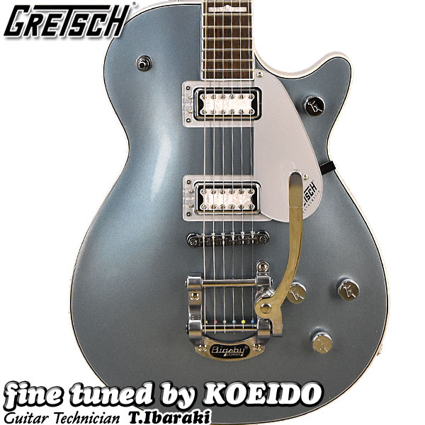 Gretschの140周年”Double Platinum”記念モデル！チェンバードメイプルトップのマホガニーボディにThin “U”マホガニーネック仕様。12インチRのローレル指板、22ミディアムジャンボフレット。PUはFT-5E FilterʼTronハムバッカーを搭載しています。Bigsby B50 Vibratoテイルピースに固定式Adjusto-Maticブリッジ。ヘッドは140周年記念プレート付きのマッチングヘッドです。Pearl Platinumのボディバック＆サイドにStone Platinumのボディトップを重ねた2トーンカラーフィニッシュが特徴的です。グレッチならではのルックスと現代的な仕様の特別な1本です。美しいカラーリングが目を惹きます！ジェットならではの勢いあるサウンドも魅力です。当店で調整してお届け致します。 Body Material：Mahogany Body Finish：Gloss Neck：Mahogany, Thin “U” Neck Finish：Gloss Fingerboard：Laurel, 12” (305 mm) Frets：22, Medium Jumbo Position Inlays：Pearloid Hump Block (Laurel) Nut (Material/Width)：Synthetic Bone, 1.6875” (42.86 mm) Tuning Machines：Die-Cast Scale Length：24.6” (625 mm) Bridge：Anchored Adjusto-Matic Pickguard：Silver Plexi with Black Gretsch and Electromatic Logos Pickups：FT-5E FilterTron (Bridge), (Middle), FT-5E FilterTron (Neck) Pickup Switching： 3-Position Toggle: Position 1. Bridge Pickup, Position 2. Bridge and Neck Pickups, Position 3. Neck Pickup Controls Volume 1. (Neck Pickup), Volume 2. (Bridge Pickup), Master Volume, Master Tone Control Knobs：G-Arrow Hardware Finish：Chrome Strings：Nickel Plated Steel (.010-.046 Gauges) ●付属品 ギグケース　