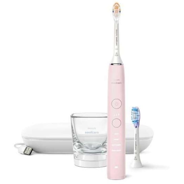SEARCH WORD：PHILIPS 電動歯ブラシ ソニッケアー 歯ブラシ デンタルケア 虫歯予防 エチケット 歯 身だしなみ 歯磨き家電 電化製品 PHILIPS Sonicare商品概要：歯垢除去力とステイン除去を兼ね備えたモデル。 ■プレミアムオールインワンブラシヘッドで、きれいな仕上がりを実現します。角度のついたアングル毛先は、届きにくい場所でも手磨きの最大20倍の歯垢を除去できます。 ■内蔵センサーはブラシ圧が強すぎることをお知らせします。ソニッケアーアプリに接続することでブラシ圧などの歯磨き習慣を記録し確認でき、歯科検診の合間のお口の健康維持をサポートします。 ■クリーン（基本のブラッシングモード）、ホワイトプラス（ステインを落とし磨き上げる）、ガムヘルス（歯垢を落とし、歯ぐきにやさしい刺激を）、ディープクリーンプラス（心地よい振動で歯垢をしっかり除去）のモードが搭載されており、さまざまなブラッシングのニーズに対応します。 ■過圧防止センサー機能。 ■ブラシヘッド認識機能で適切なモードと強さを自動設定。 ■ブラシヘッド交換時期をわかりやすくランプでお知らせ。商品仕様：■メーカー：フィリップス■JANコード：8710103992912■商品名：ソニッケアー sonicare ダイヤモンドクリーン9000 電動歯ブラシ ピンク PHILIPS■型番：HX9911/58■カラー：ピンク■本体サイズ（高さ×幅×奥行）：約252x31x28 (mm)■本体重量：約134g■磨き方式：音波・超音波式■振動数：約31000 ブラシストローク/分■搭載モード：クリーン、ホワイトプラス、ガムヘルス、ディープクリーンプラス■使用可能時間：約2週間（2分間のブラッシングを1日2回）■充電時間：約24時間■充電残量表示：有■スマホアプリ対応：対応■ブラシ交換お知らせ：○ ※RFID内蔵ブラシヘッドを使用した場合■本体丸洗い：丸洗い不可■対応電圧：AC100V-240V■付属品：ハンドル、プレミアムオールインワンブラシヘッド（1本）、プレミアムガムケアブラシヘッド（1本）、充電器用グラス（1個）、充電器台（1個）、USB充電トラベルケース（1個）■ご注意事項：※掲載写真は表記サイズと異なる場合がございます。※画面上のカラーはご使用ブラウザやモニターの設定により、実物とは若干異なる場合がございます。あらかじめご了承の上、ご注文をお願いいたします。※商品概要、仕様、サービス内容及び企業情報などは商品発表時点のものです。※最新の情報に関しましては、メーカーサイトをご覧ください。※発売前予約商品についてはメーカーの商品製造数により納期が遅れる場合やご注文キャンセルをお願いする場合がございます。