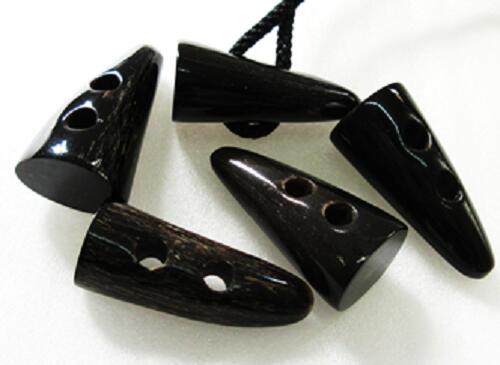 水牛ダッフルボタン・50mm。特上黒（天然色）。5個（セット）の価格。長さ50m/m・二つ穴（紐穴の径6m/m..