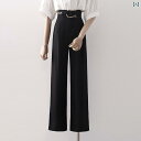 スラックス レディース ロングパンツ ボトムス 長ズボン 春夏 ドレープ ワイドレッグ ハイウエスト 黒 白 ウエストデザイン メタルバックル 後ろウエストゴム モダン スタイリッシュ エレガント ミニマル