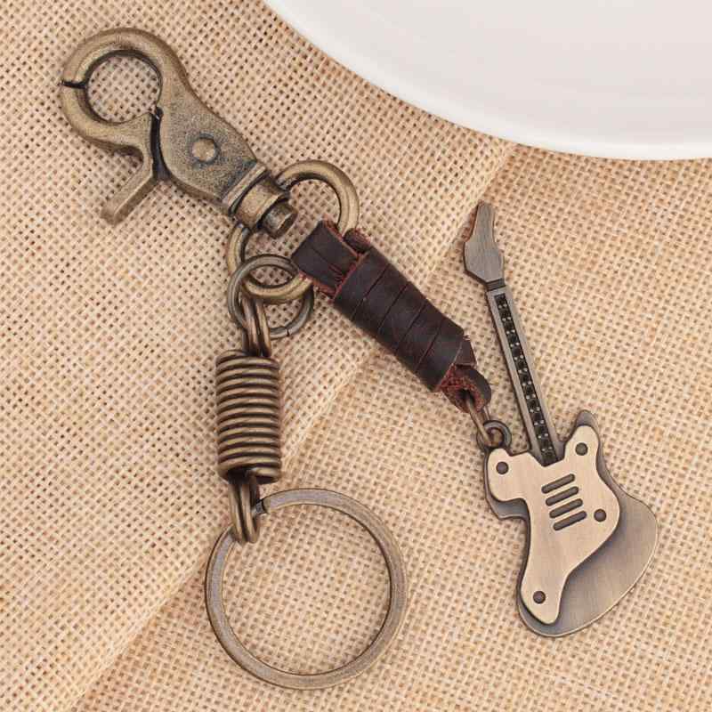 キーホルダー レトロ 合金 ヴィンテージ ユニーク 手編み ベースギターモチーフ おしゃれ レザー 音楽 バッグアクセサリー ストラップ 牛革 かっこいい