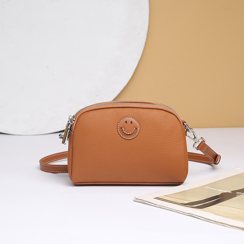 レディース ファッション 夏 スタイル 牛革 ショルダーバッグ クロスボディ スマイル柄 ダブルジッパー 大容量 収納力 柔らかい ポケット多 旅行 日常使い ミニマル