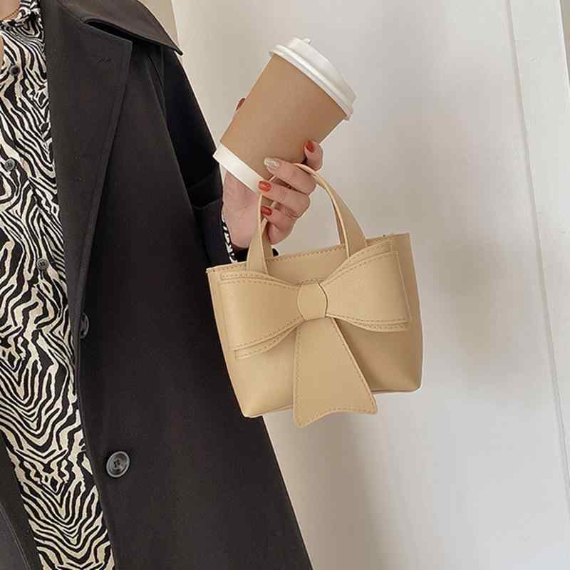 ハンドバッグ 女性用 秋冬 韓国風 復古 質感 小型 水桶バッグ かわいい 蝶結び 小方形 鞄 街頭 潮流 スタイル 日常 使い カードケース ジッパー ソフト 素材 縦型 形状 単肩 ストラップ かき色 ブラック ブラウン ピンク系