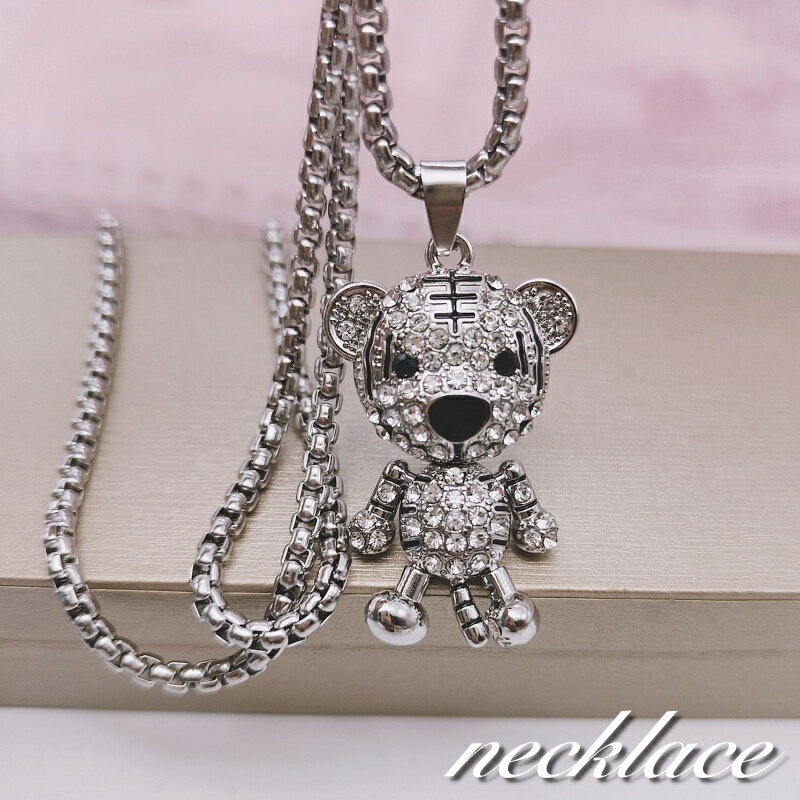 Free shipping! Women's necklace pendant, featuring a bear design with rhinestones and a chain. Sparkling silver color. Stylish and cute. Perfect for outings and as a gift. Fashion accessory.