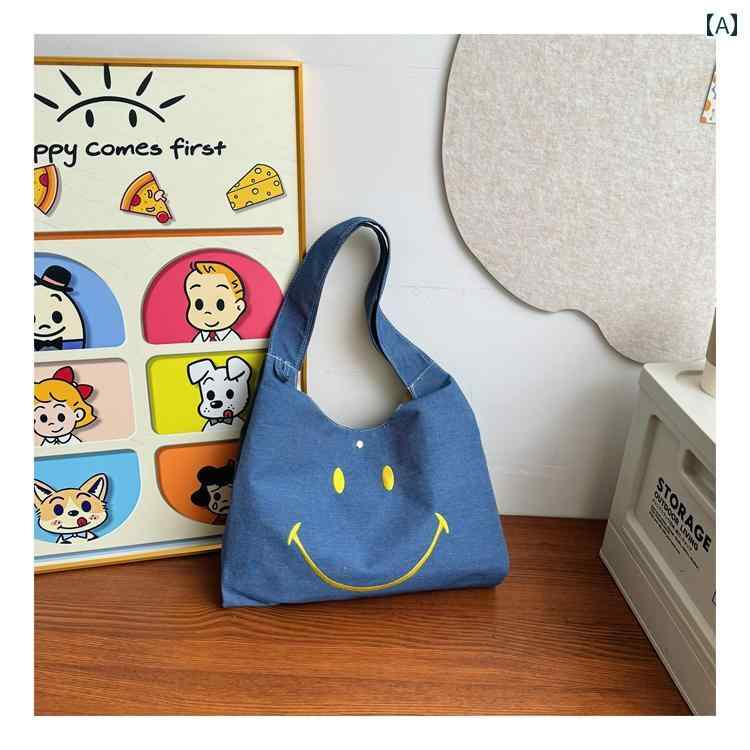 かわいい キッズショルダーバッグ おしゃれ スマイリーフェイス大容量 子供用 脇下 バッグ 2025 ボーイズ カジュアルショルダーバッグ ガールズ トートバッグ